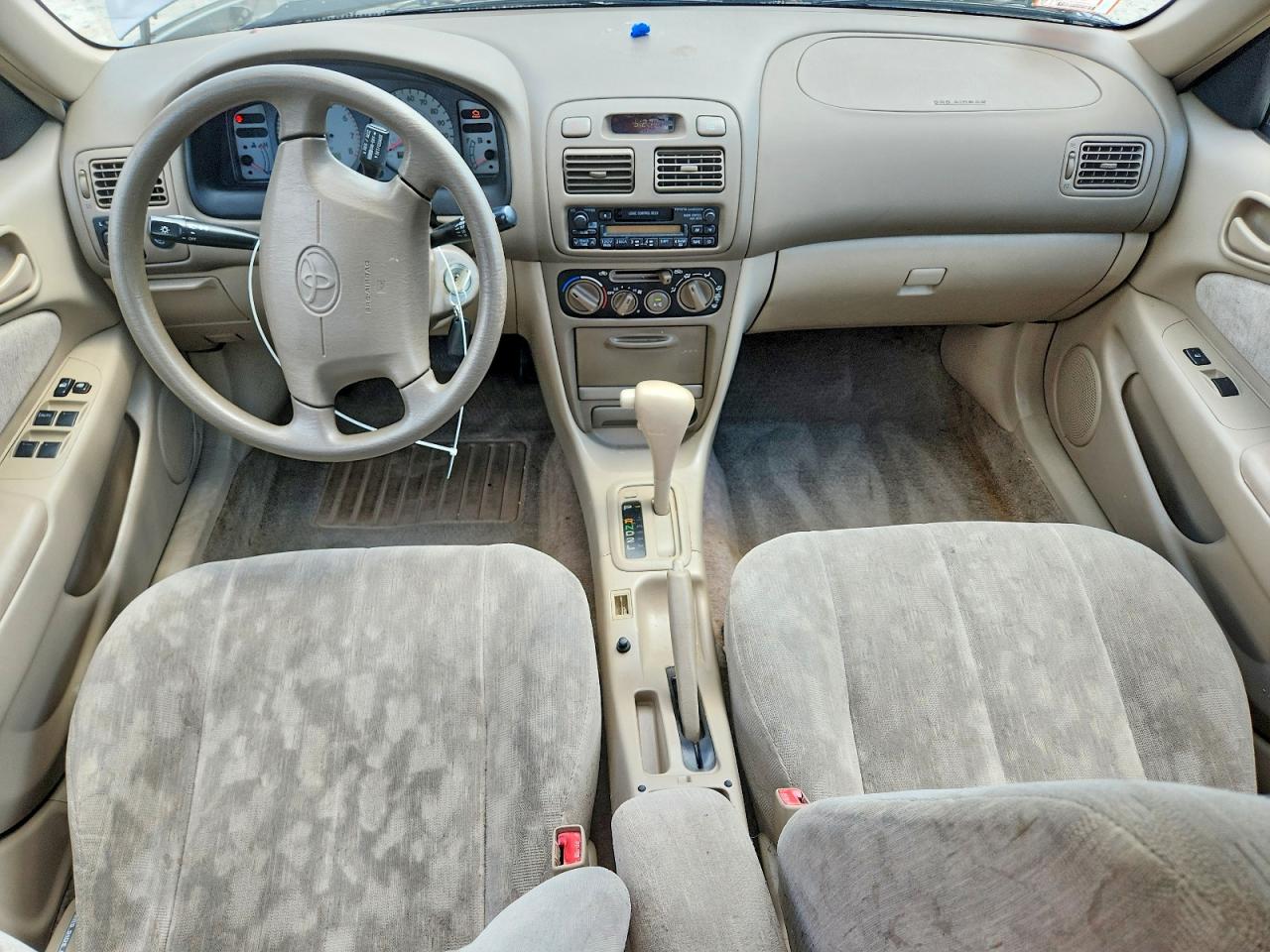 1999 Toyota Corolla Tan vin: 2T1BR18E3XC176030