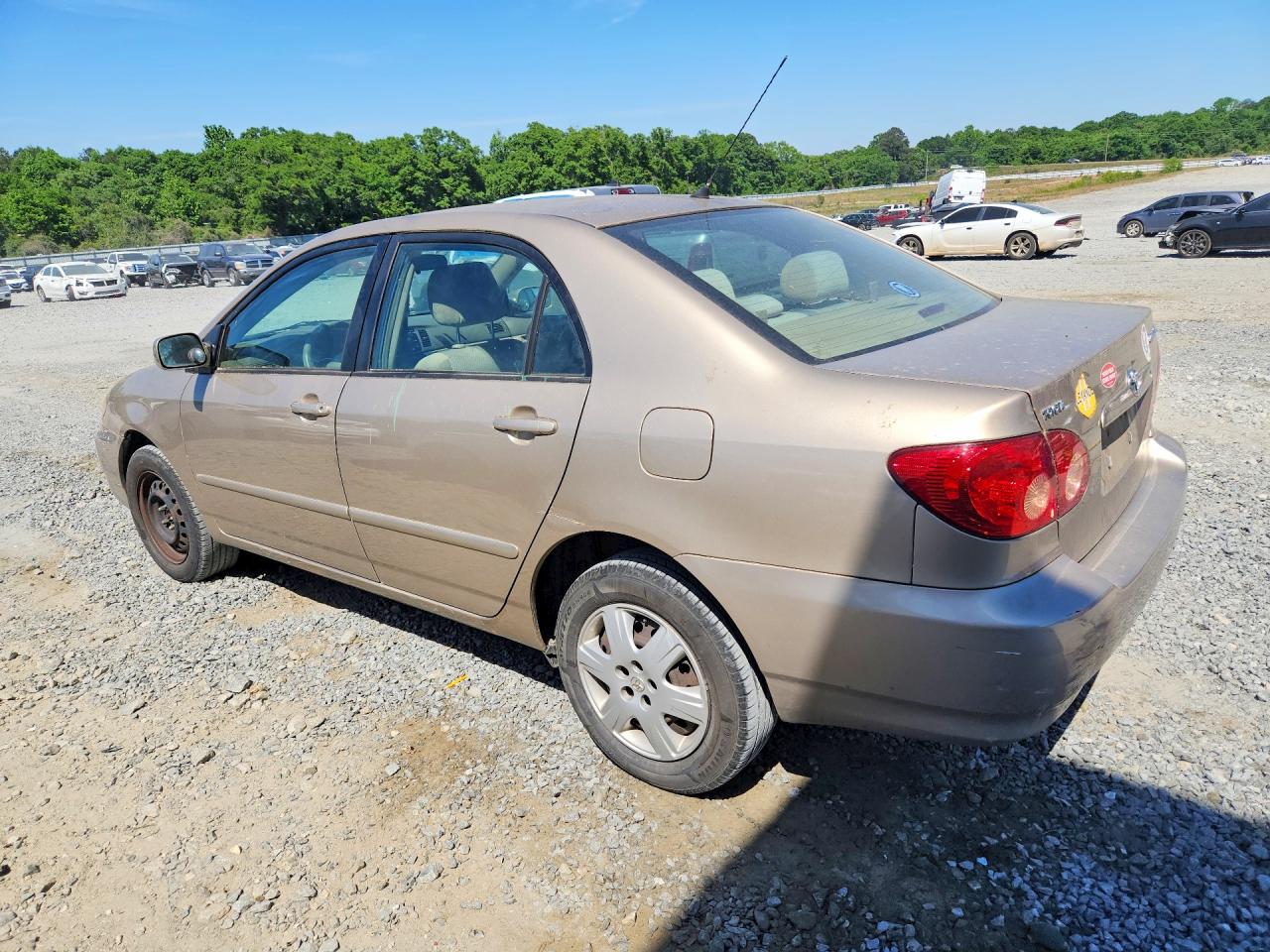 2005 Toyota Corolla Le Gold vin: 2T1BR30E65C557617