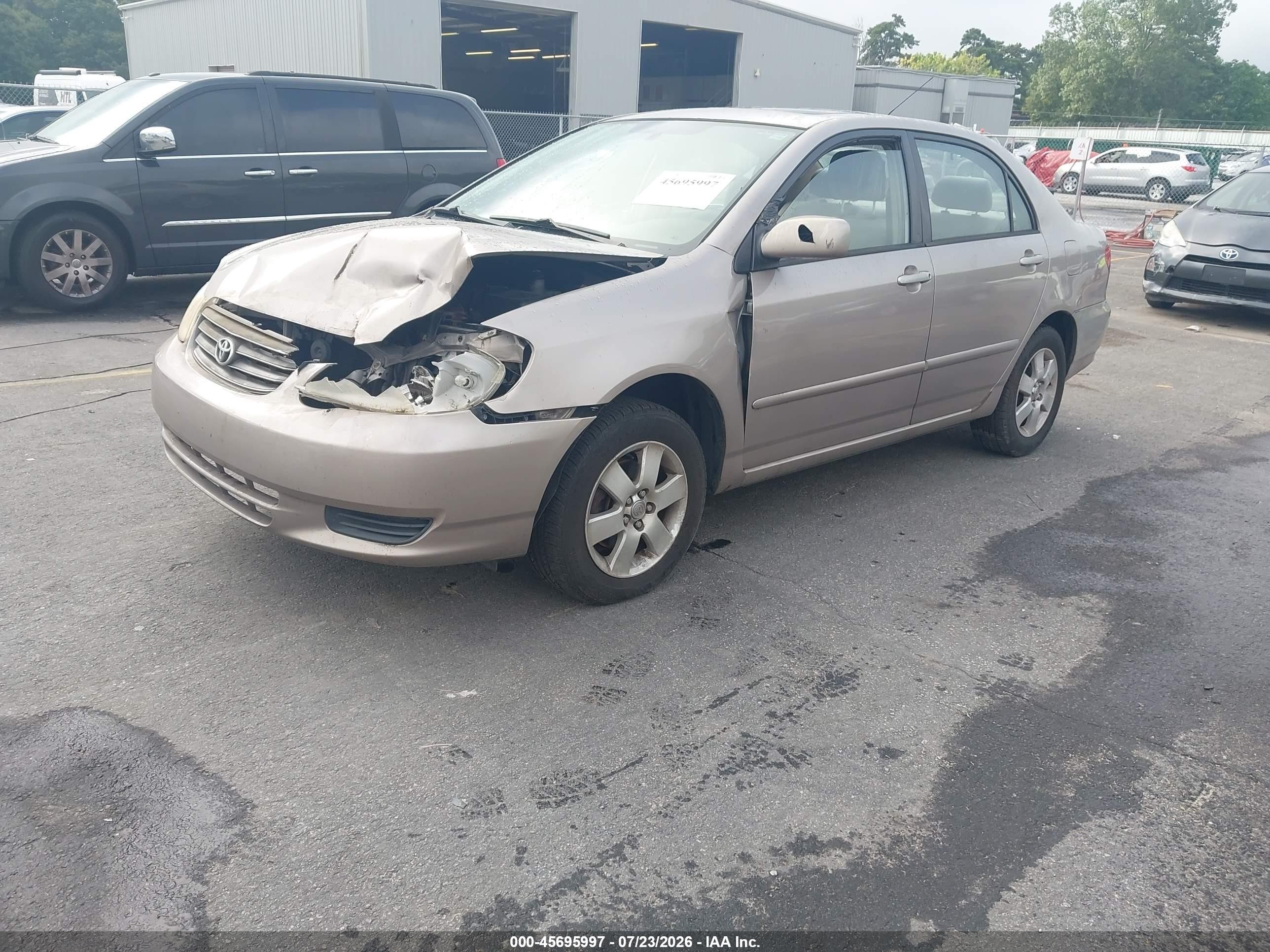 2003 Toyota Corolla Le Beige vin: 2T1BR32E03C138740