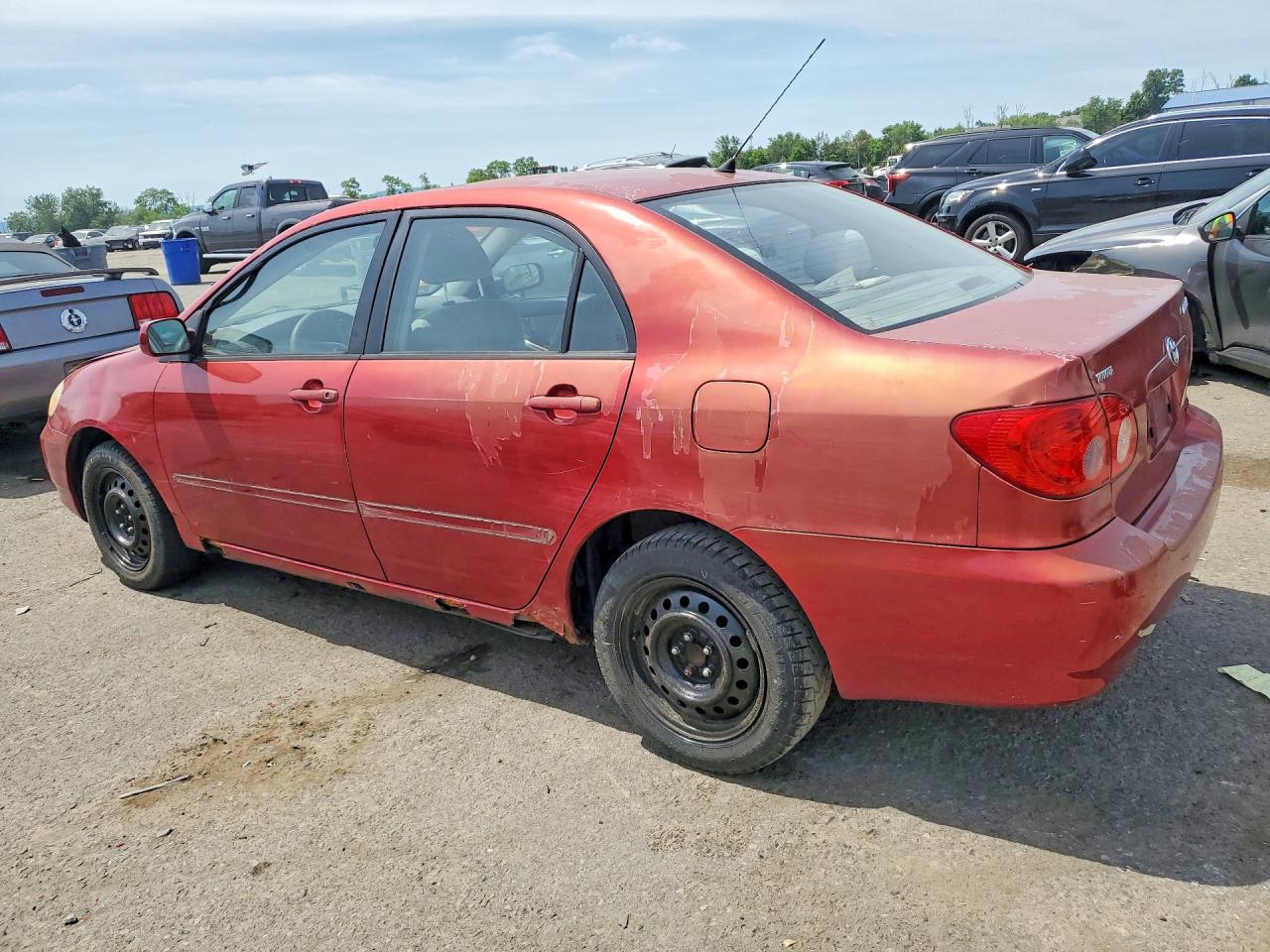 2003 Toyota Corolla Le Red vin: 2T1BR32E33C119583