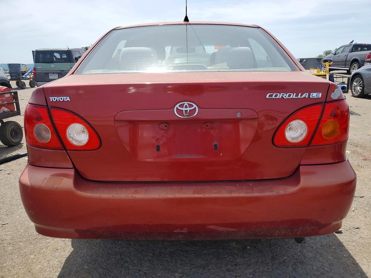 2003 Toyota Corolla Le Red vin: 2T1BR32E33C119583