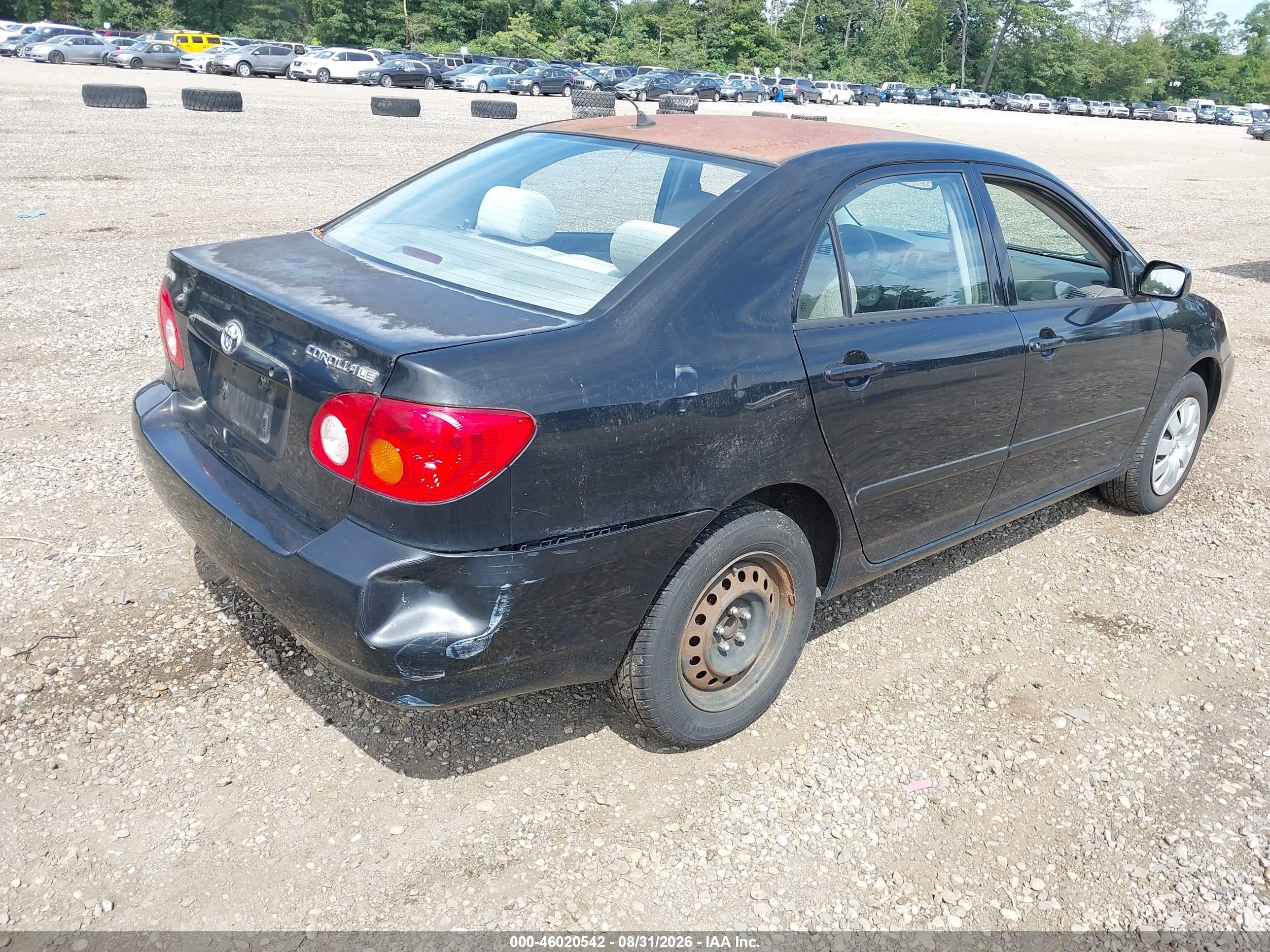 2003 Toyota Corolla Le Black vin: 2T1BR32E43C115560