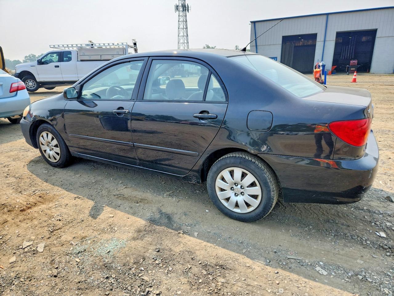 2003 Toyota Corolla Le Black vin: 2T1BR32E73C112765