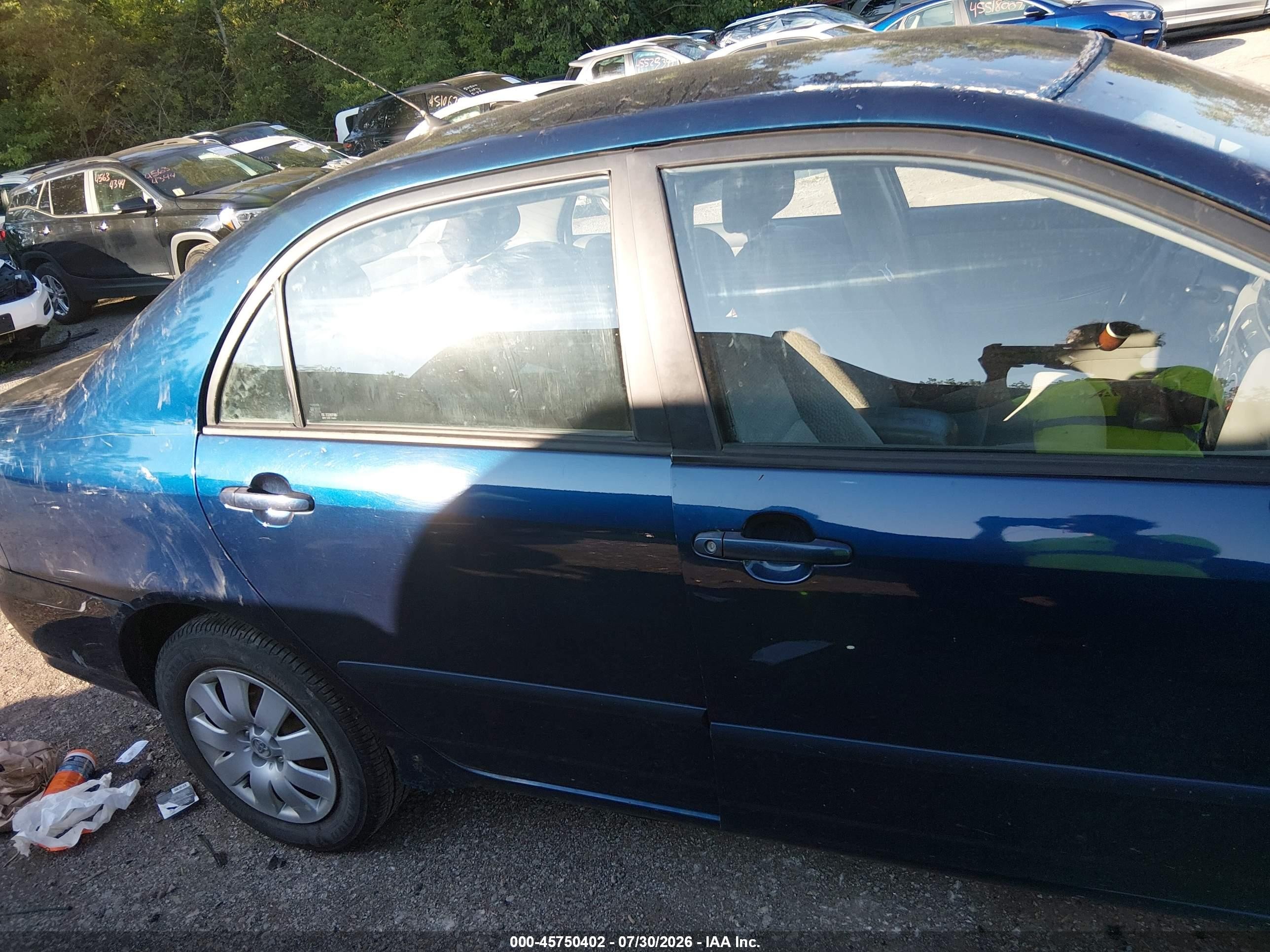 2004 Toyota Corolla Le Blue vin: 2T1BR32E74C198080