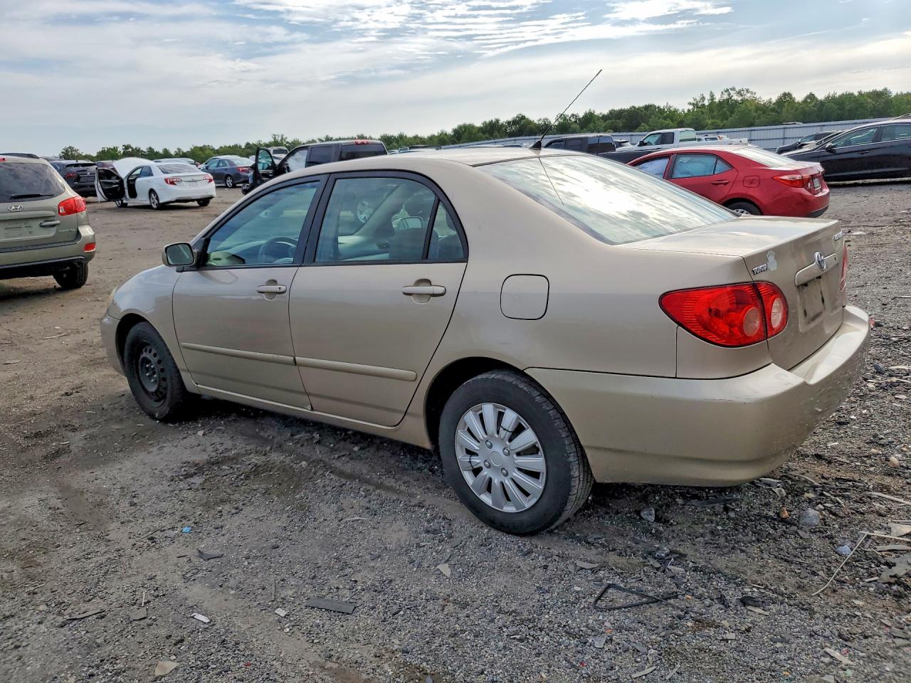 2005 Toyota Corolla Le Gold vin: 2T1BR32E95C422189
