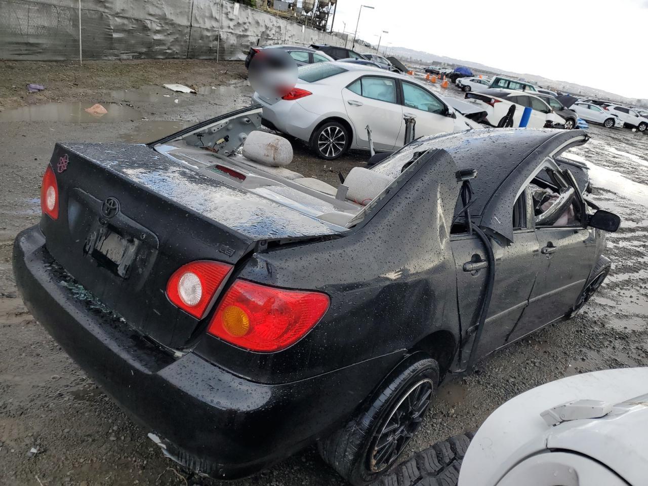2003 Toyota Corolla Ce   Black vin: 2T1BR38E03C011834