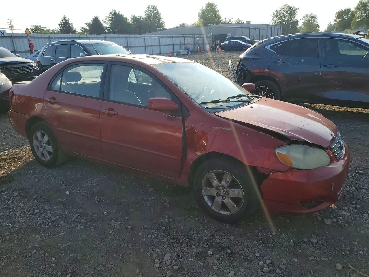 2004 Toyota Corolla Le Red vin: 2T1BR38E94C240093
