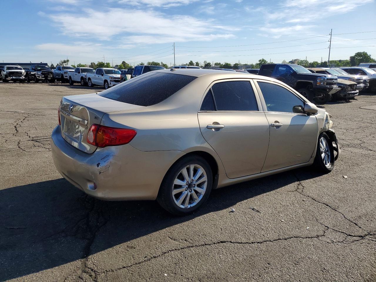 2009 Toyota Corolla Le Gold vin: 2T1BU40E29C011066