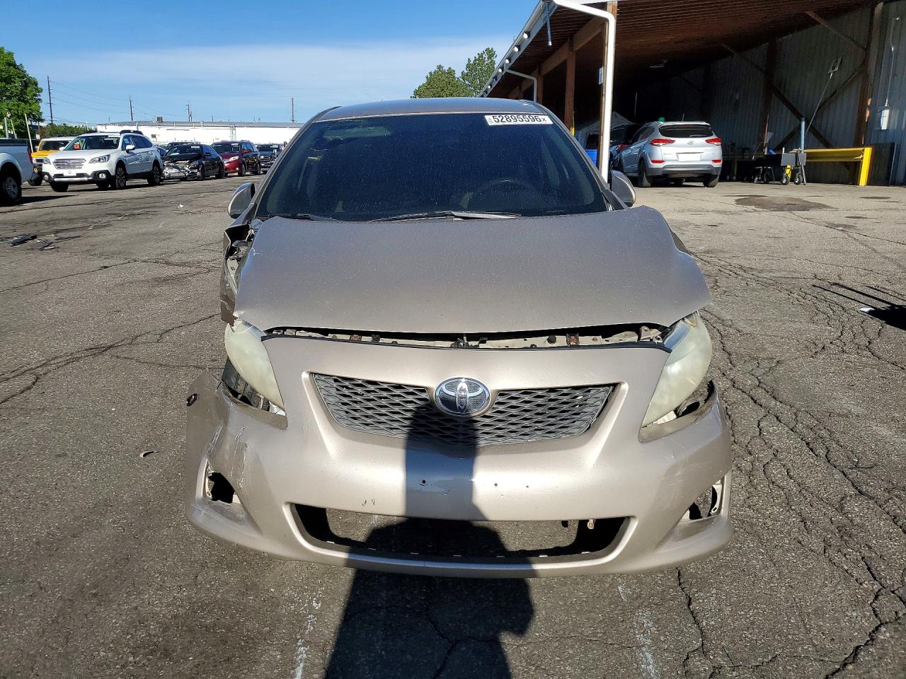 2009 Toyota Corolla Le Gold vin: 2T1BU40E29C011066