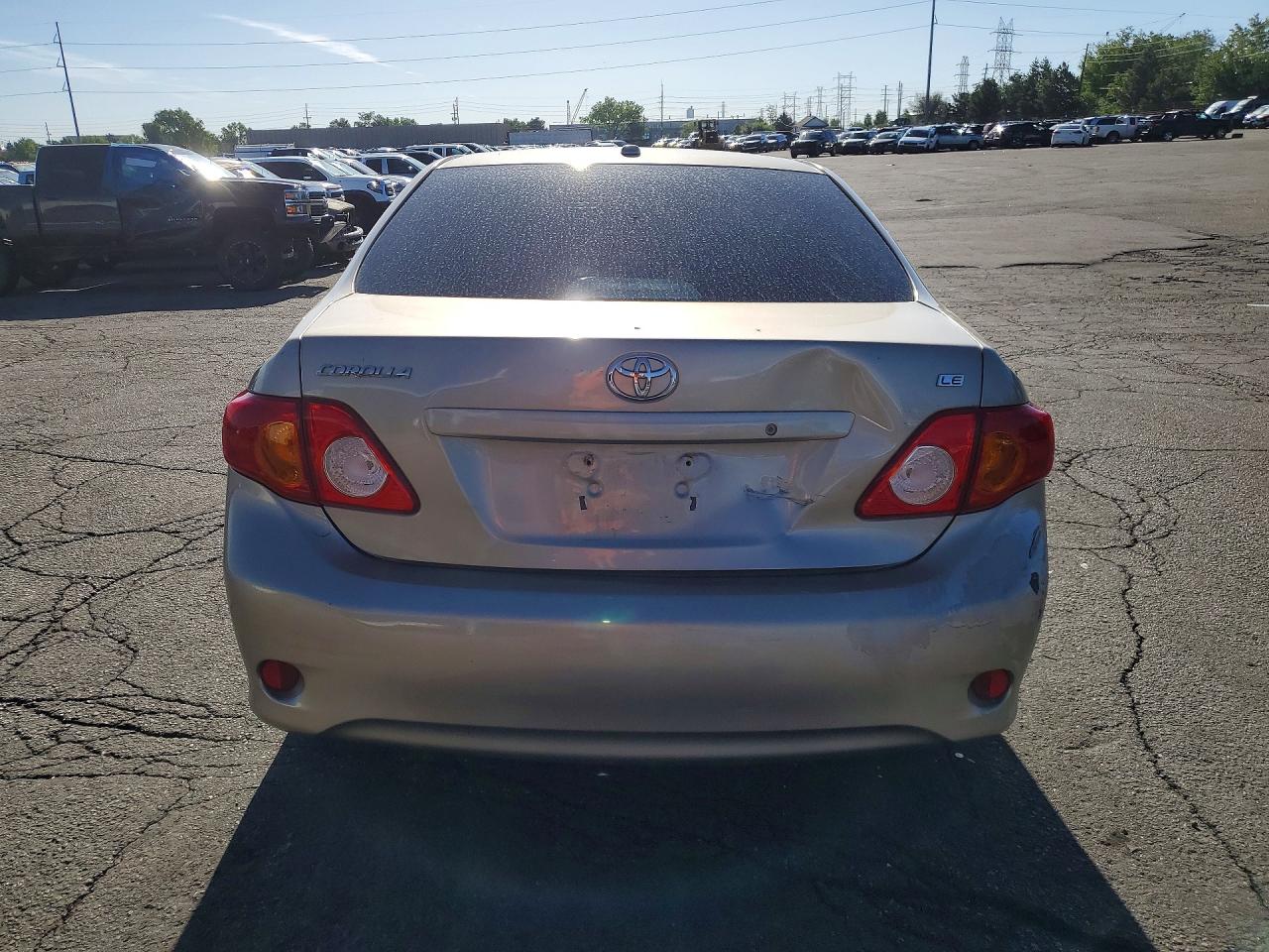 2009 Toyota Corolla Le Gold vin: 2T1BU40E29C011066