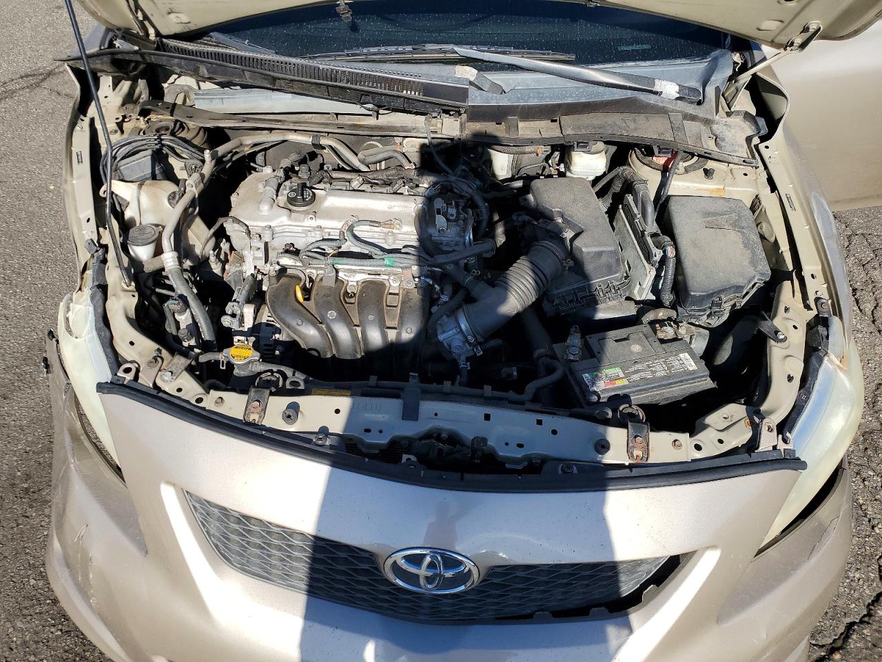 2009 Toyota Corolla Le Gold vin: 2T1BU40E29C011066