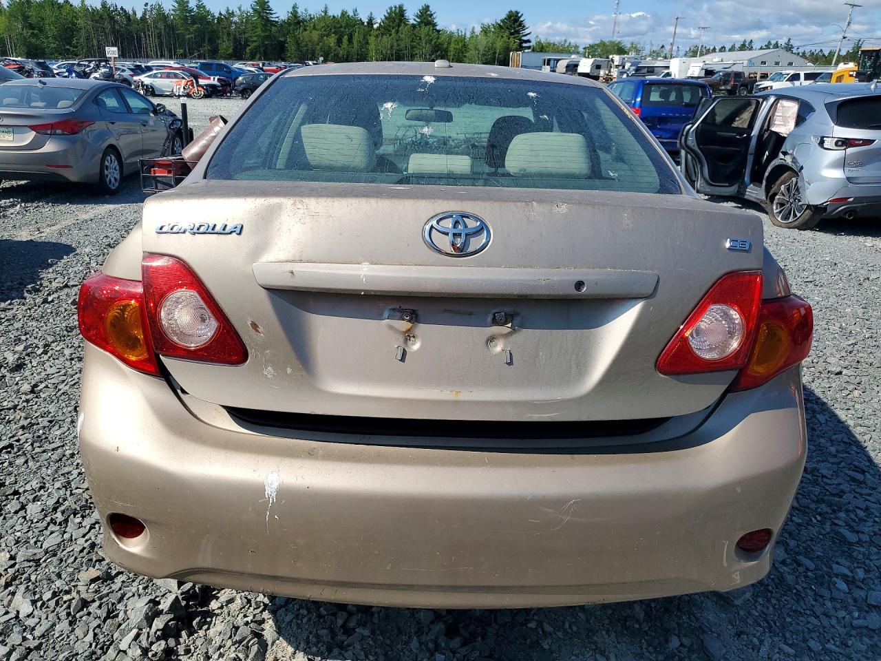 2009 Toyota Corolla Base Beige vin: 2T1BU40E29C070831