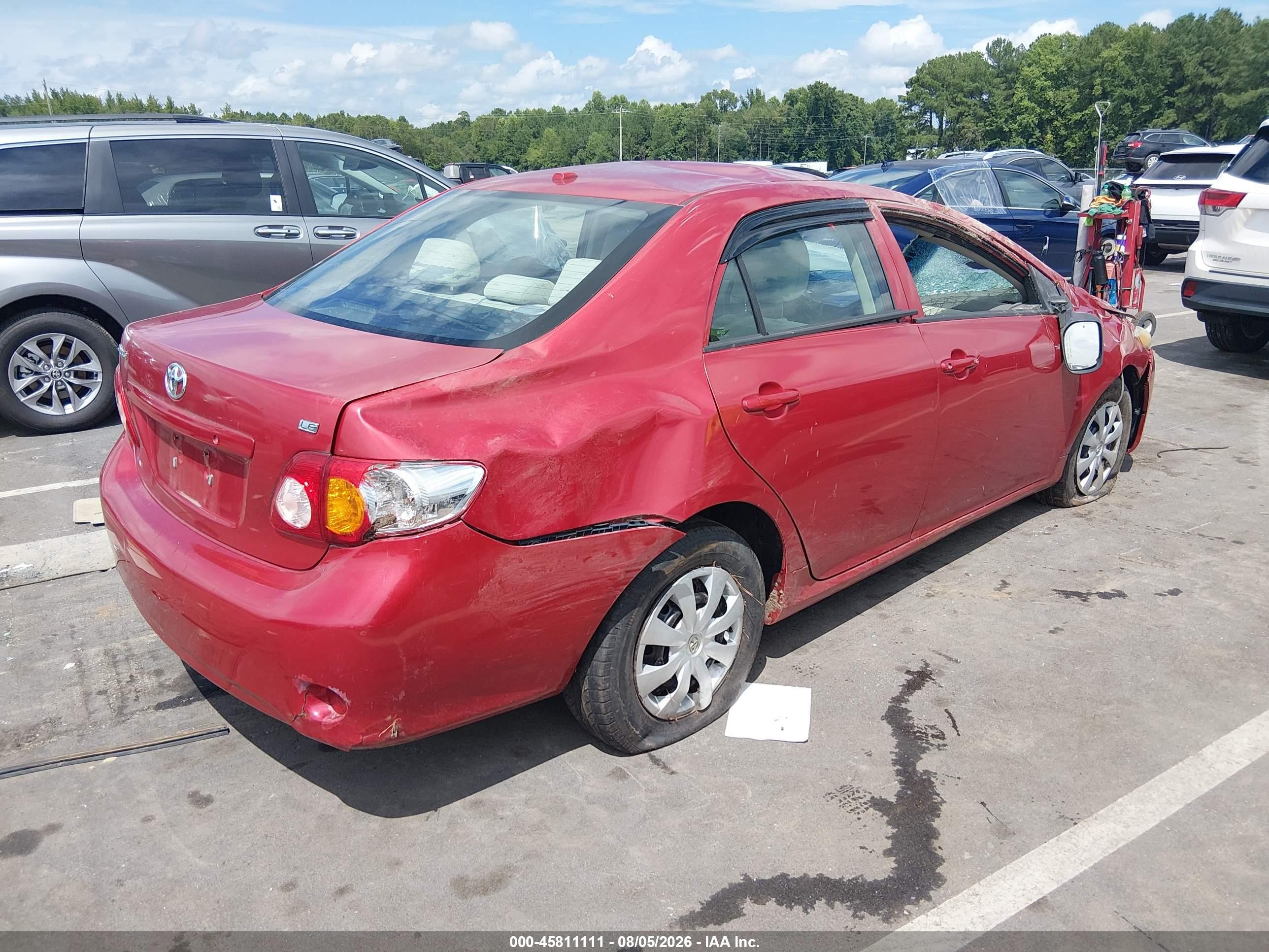 2009 Toyota Corolla Le Красный vin: 2T1BU40E29C114097