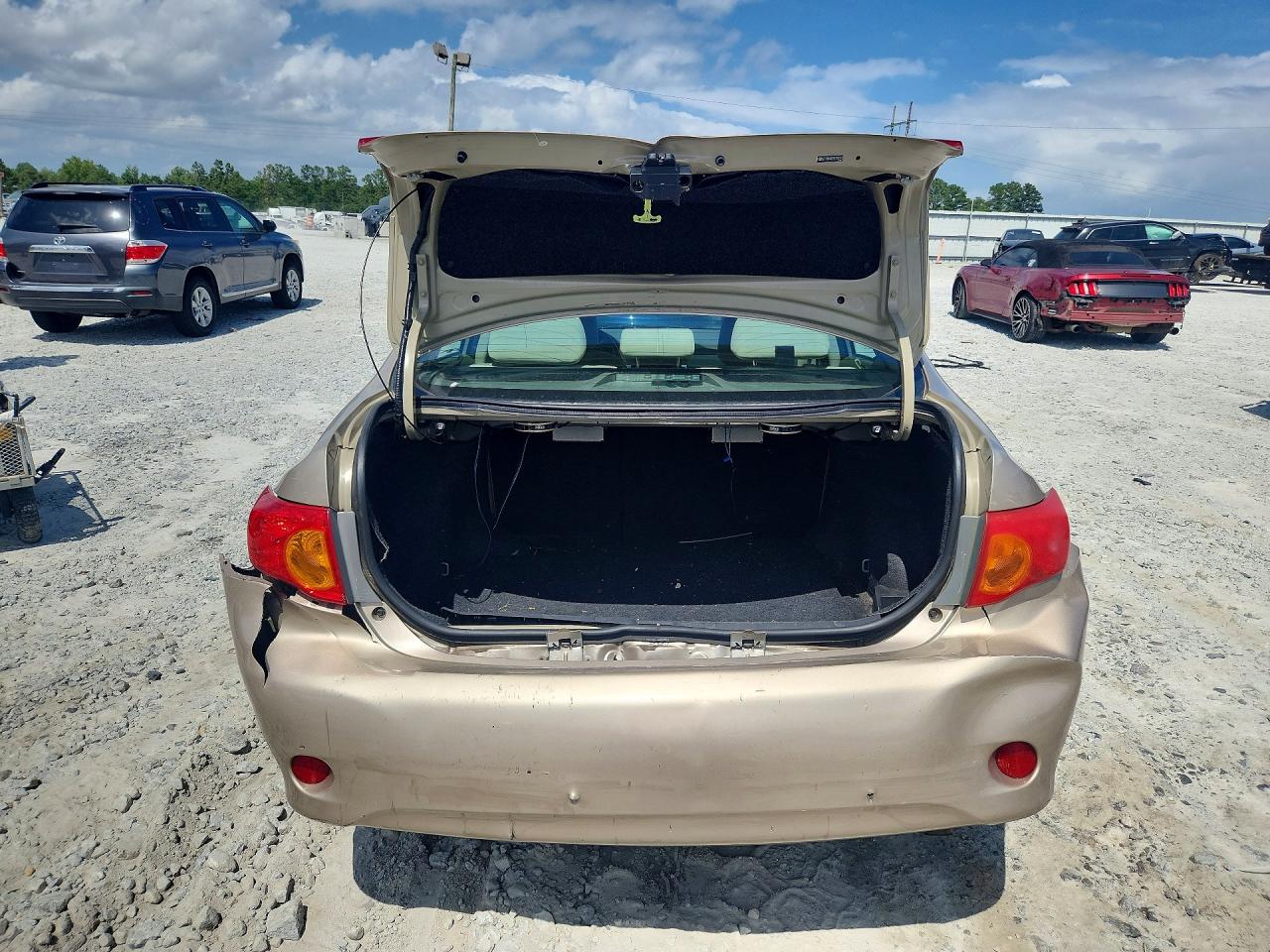 2009 Toyota Corolla Xle Золотой vin: 2T1BU40E29C166149
