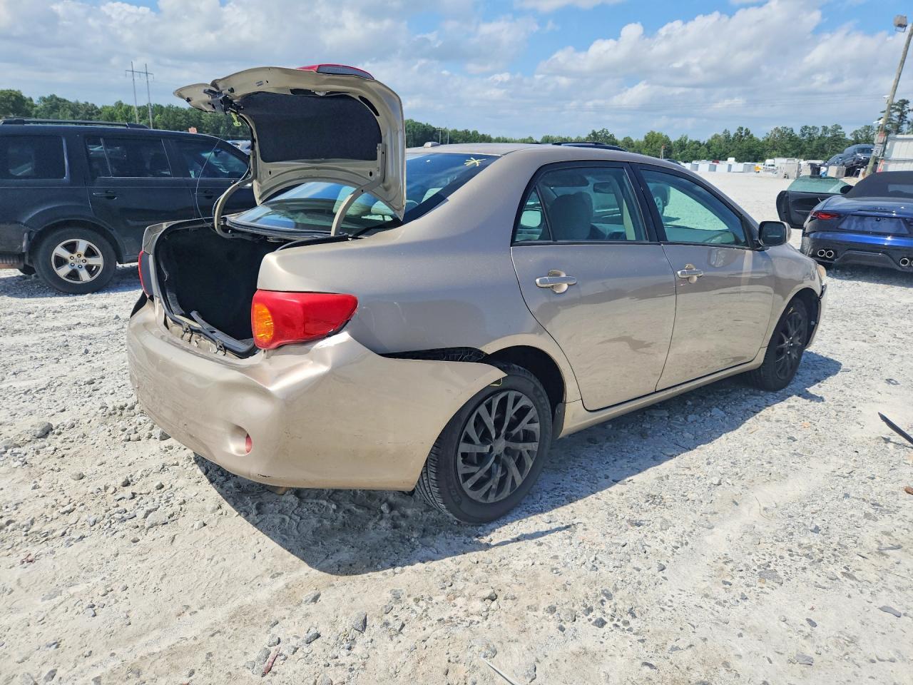 2009 Toyota Corolla Xle Золотой vin: 2T1BU40E29C166149