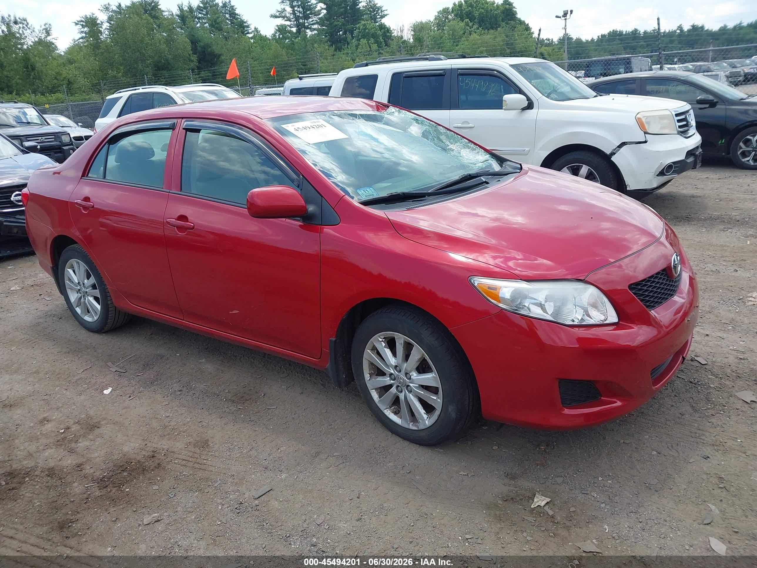 2009 Toyota Corolla Le Red vin: 2T1BU40E39C045291