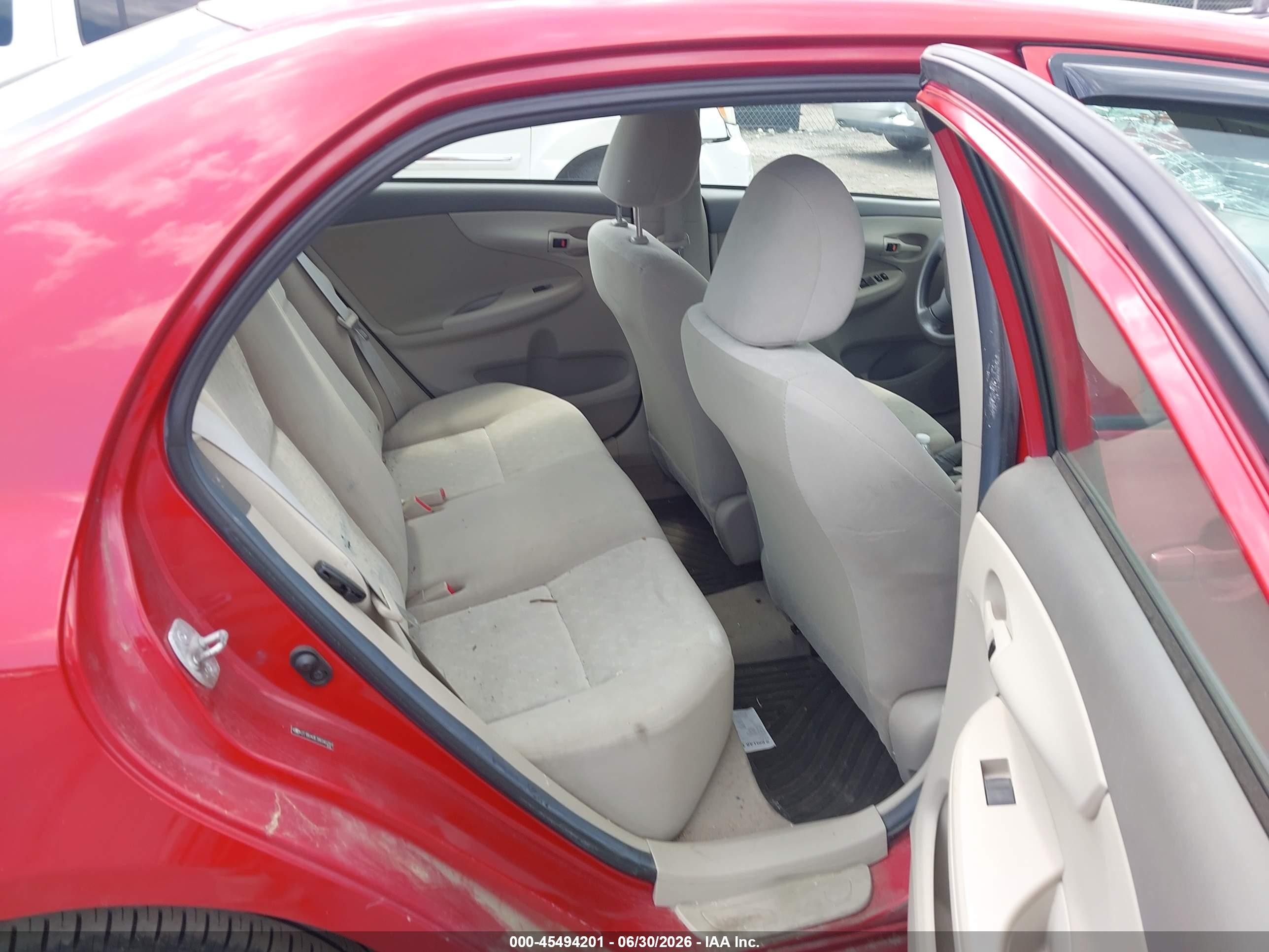 2009 Toyota Corolla Le Red vin: 2T1BU40E39C045291