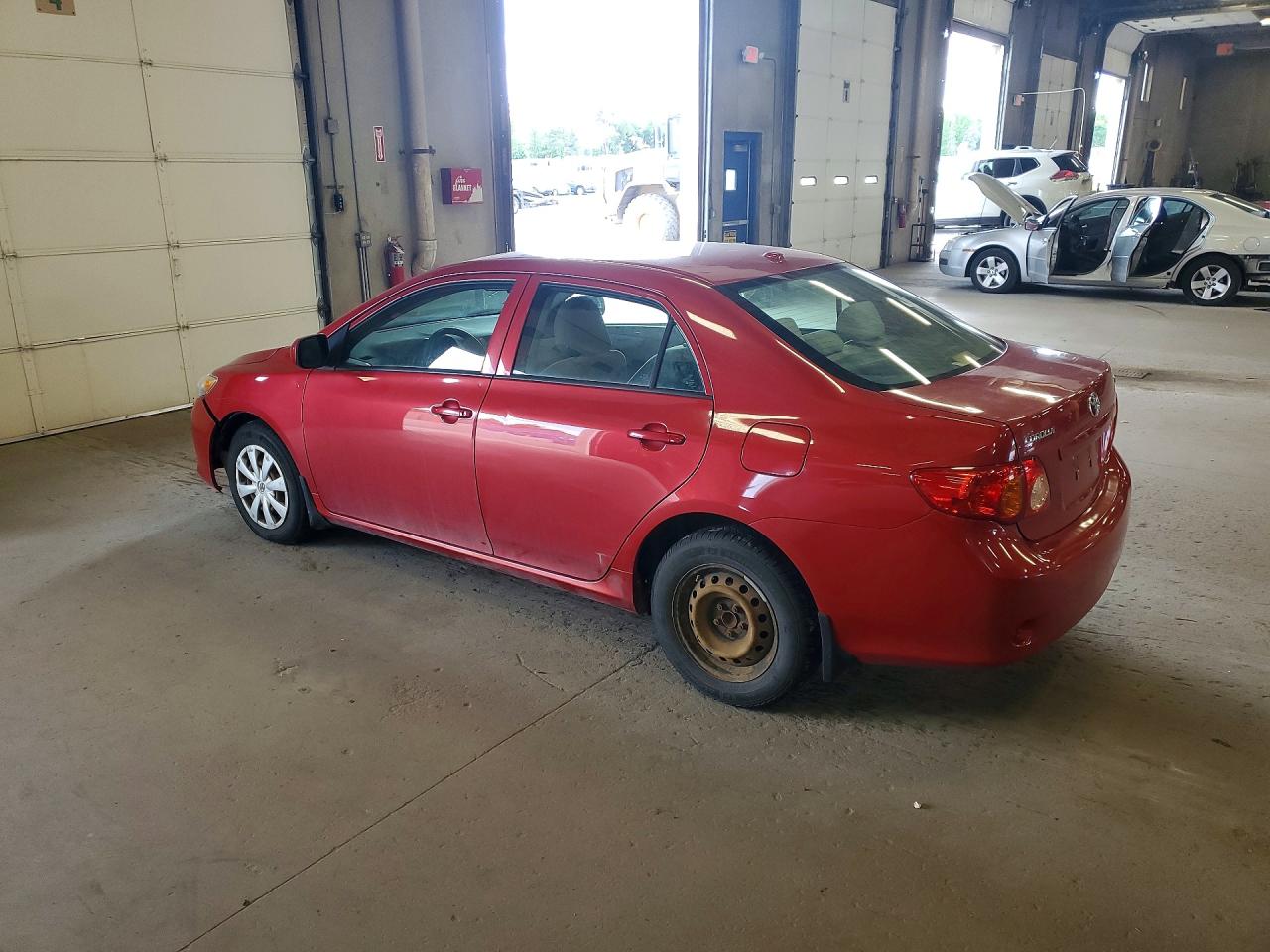 2009 Toyota Corolla Le Red vin: 2T1BU40E39C111208