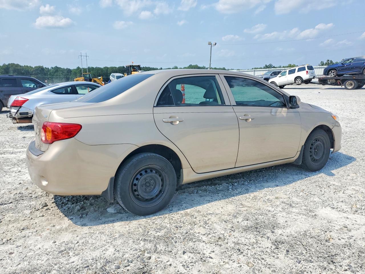 2009 Toyota Corolla Le Gold vin: 2T1BU40E39C126727
