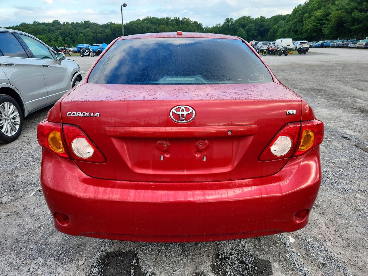 2009 Toyota Corolla Le Red vin: 2T1BU40E49C031755