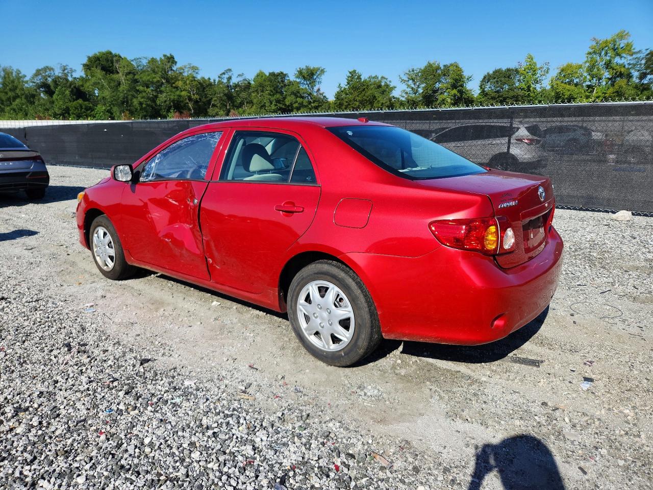 2009 Toyota Corolla Le Red vin: 2T1BU40E49C113355