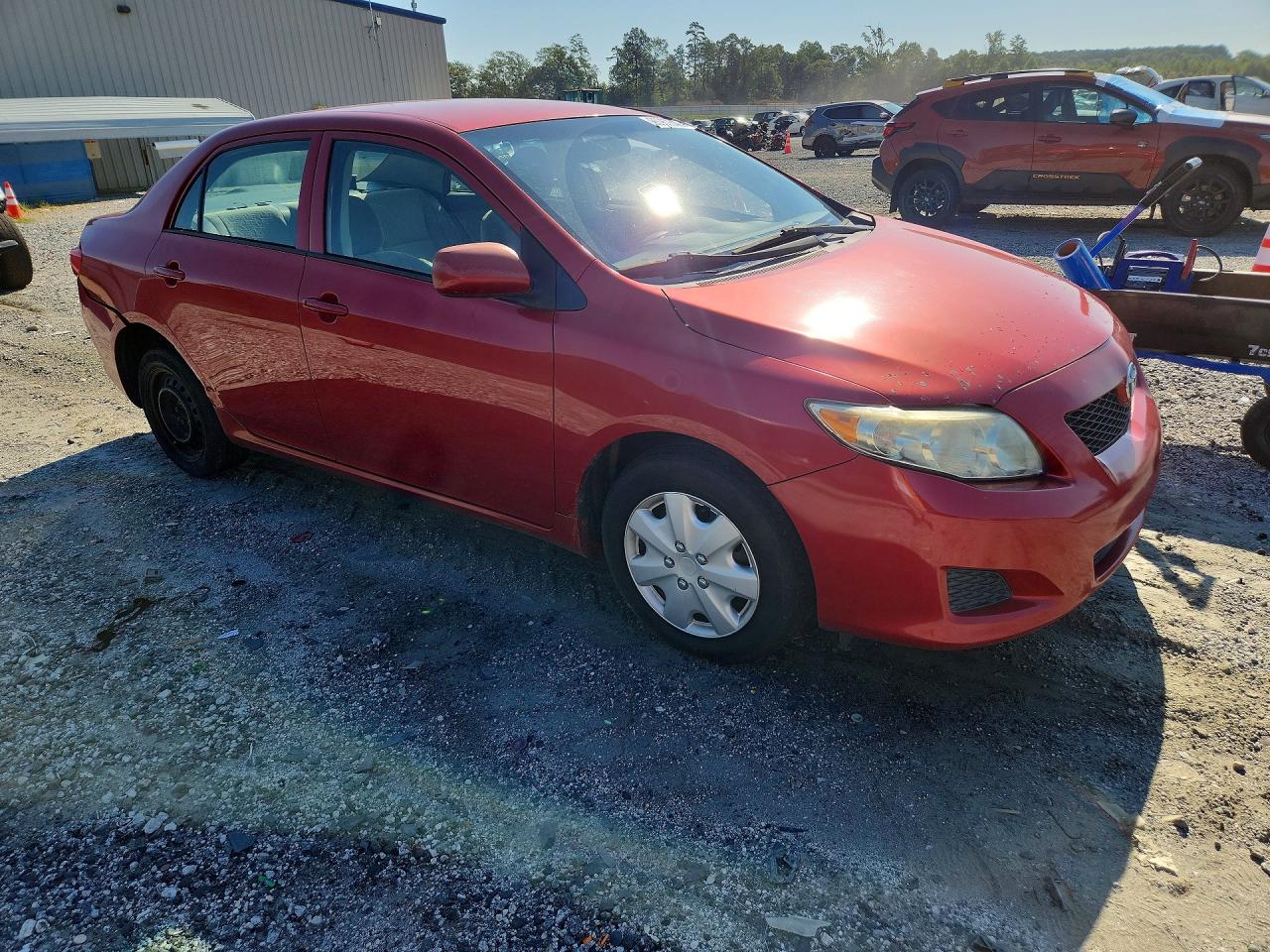 2009 Toyota Corolla Le Red vin: 2T1BU40E49C113355