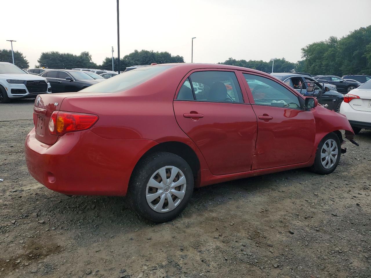2009 Toyota Corolla Le Red vin: 2T1BU40E49C162667