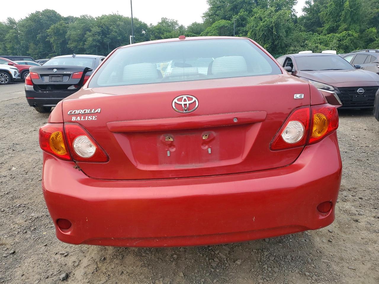2009 Toyota Corolla Le Red vin: 2T1BU40E49C162667