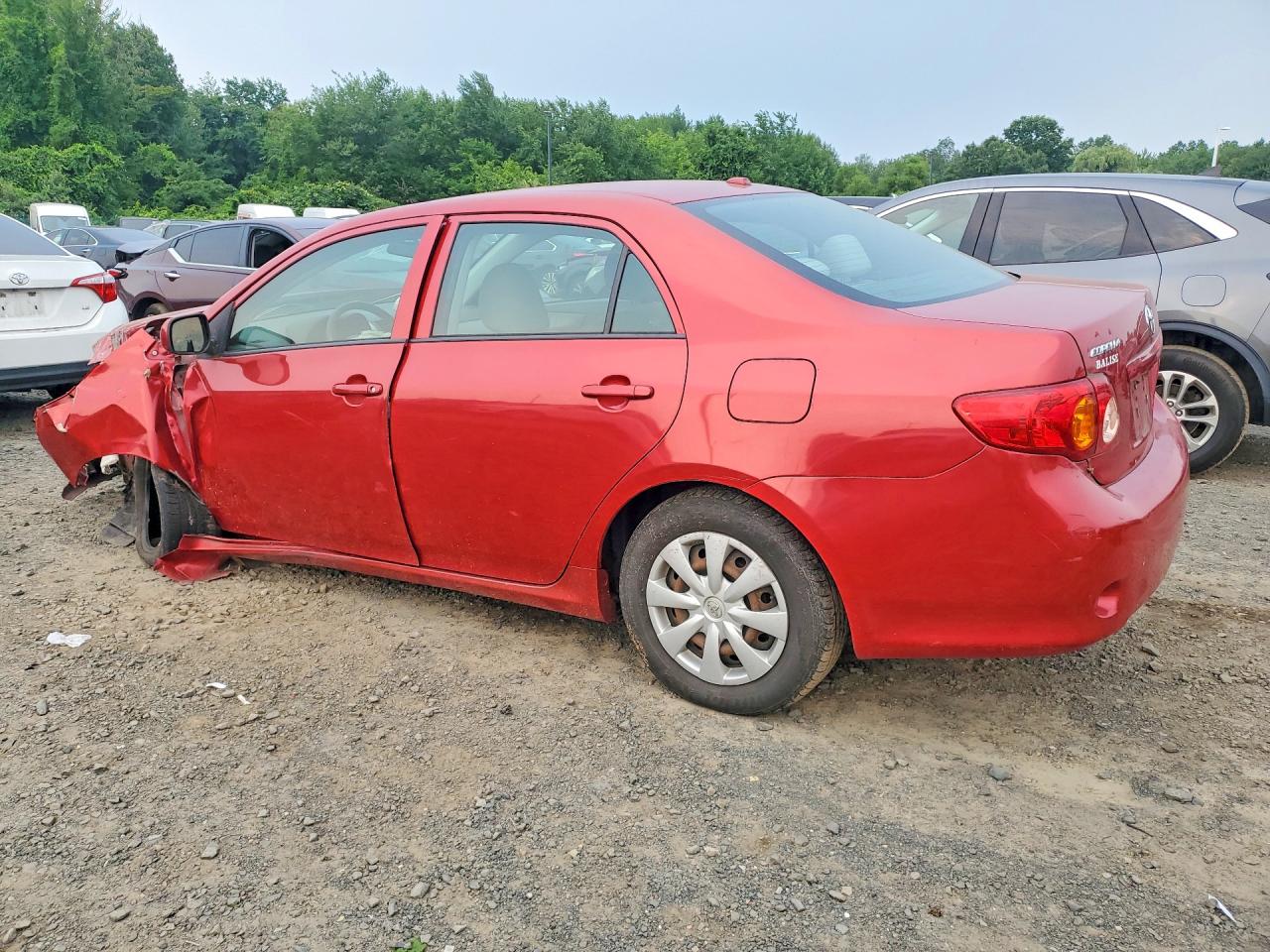 2009 Toyota Corolla Le Red vin: 2T1BU40E49C162667