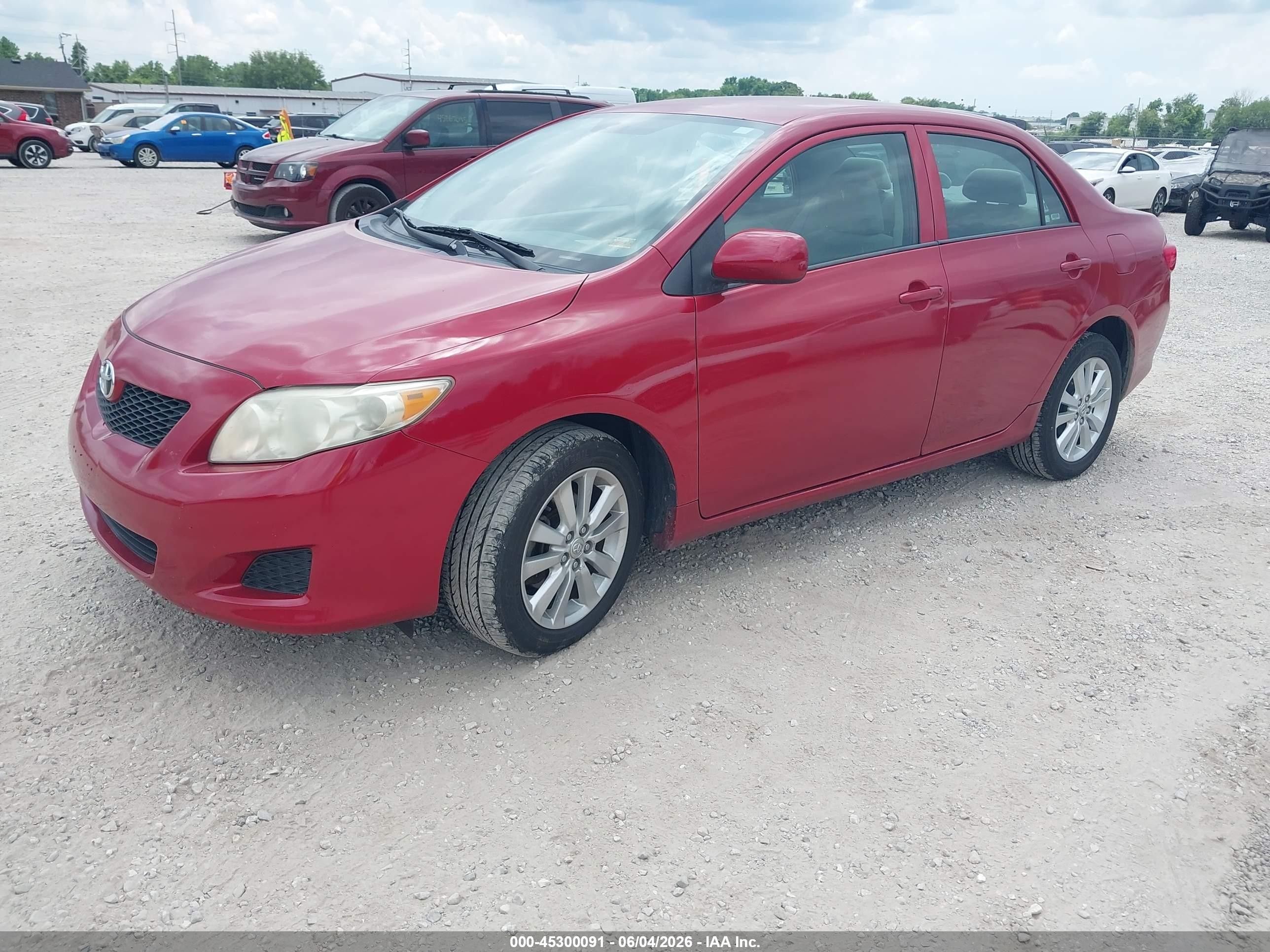 2009 Toyota Corolla Le Red vin: 2T1BU40E69C043048