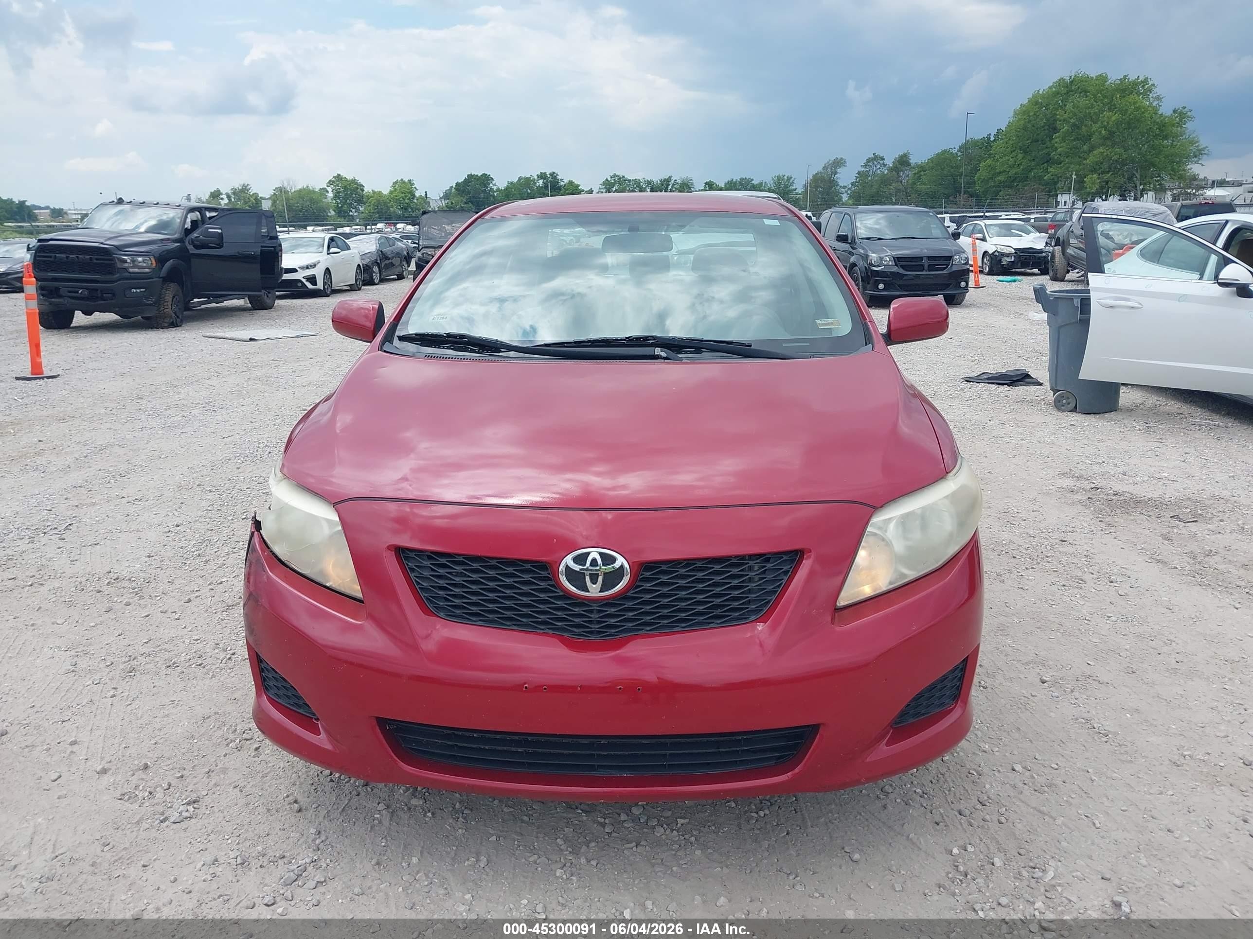 2009 Toyota Corolla Le Red vin: 2T1BU40E69C043048