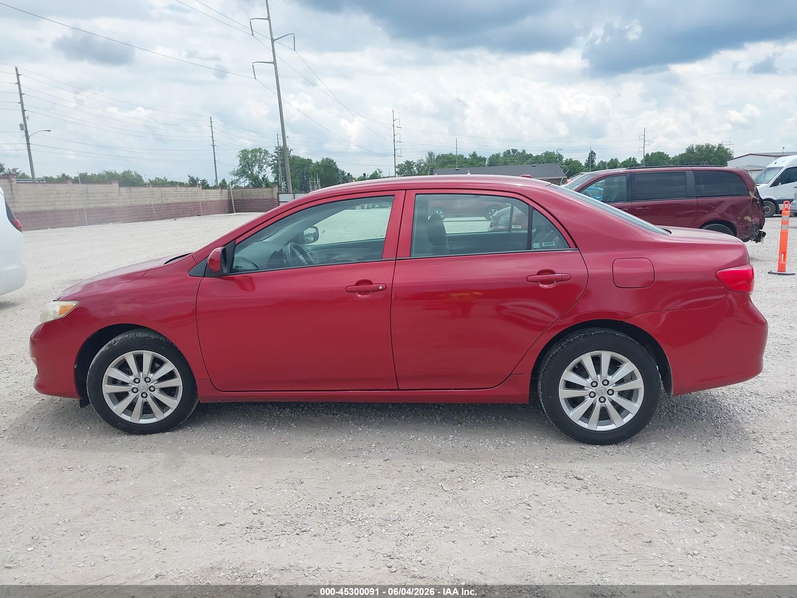 2009 Toyota Corolla Le Red vin: 2T1BU40E69C043048