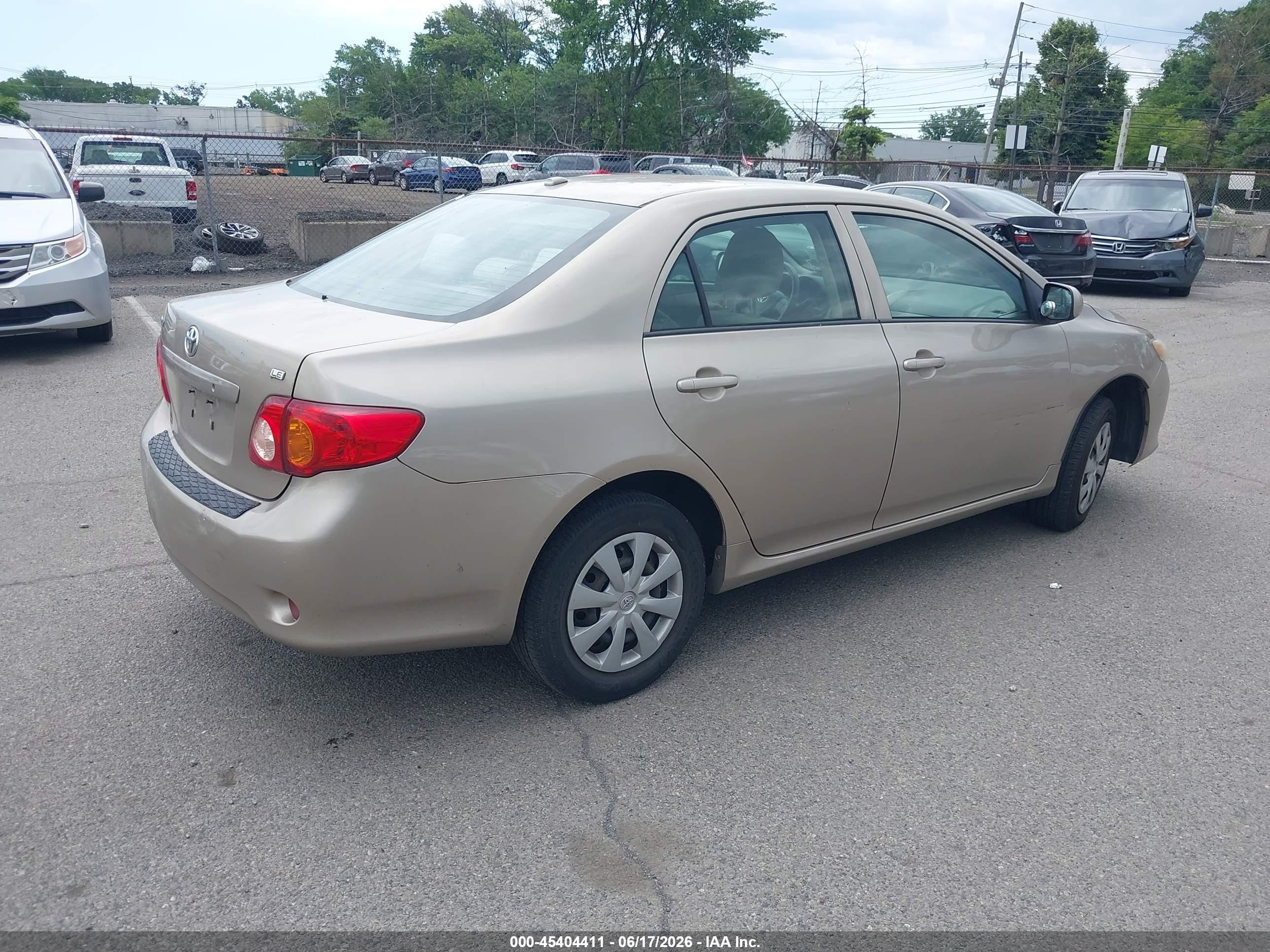 2009 Toyota Corolla Le Gold vin: 2T1BU40E69C070248