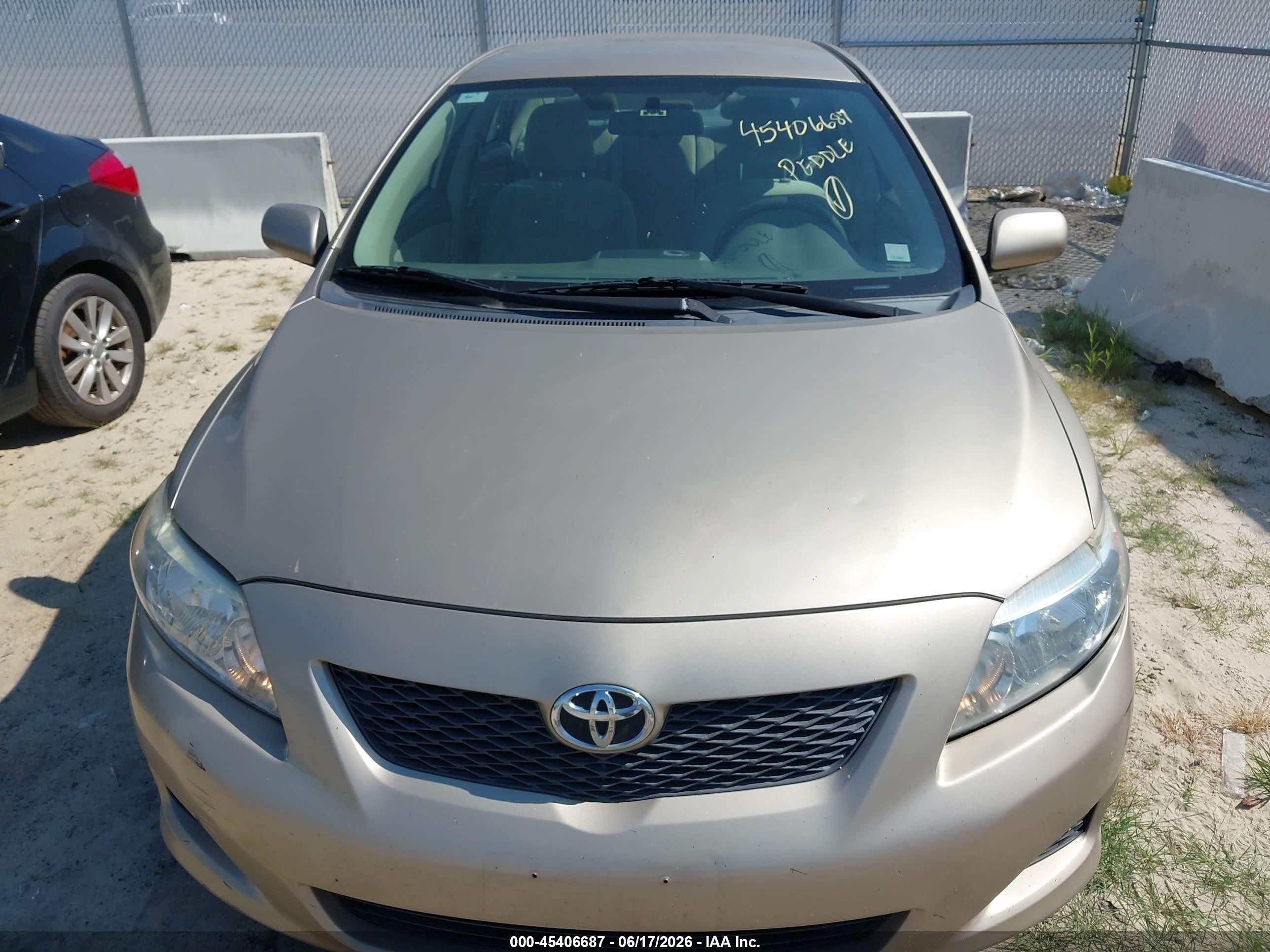 2009 Toyota Corolla Le Tan vin: 2T1BU40E69C075563