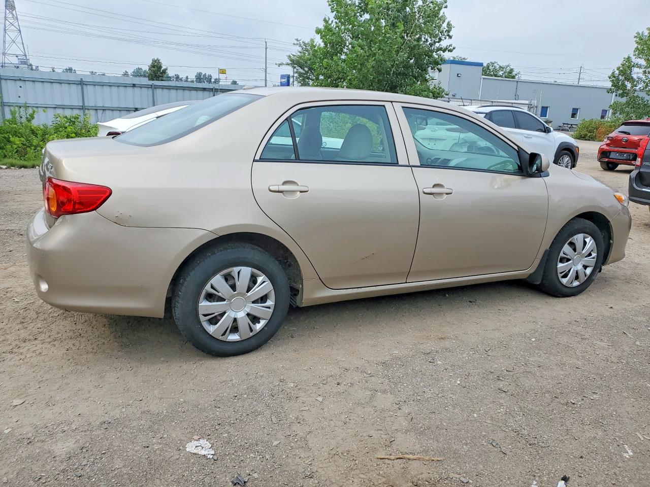 2009 Toyota Corolla Base Золотой vin: 2T1BU40E79C022614