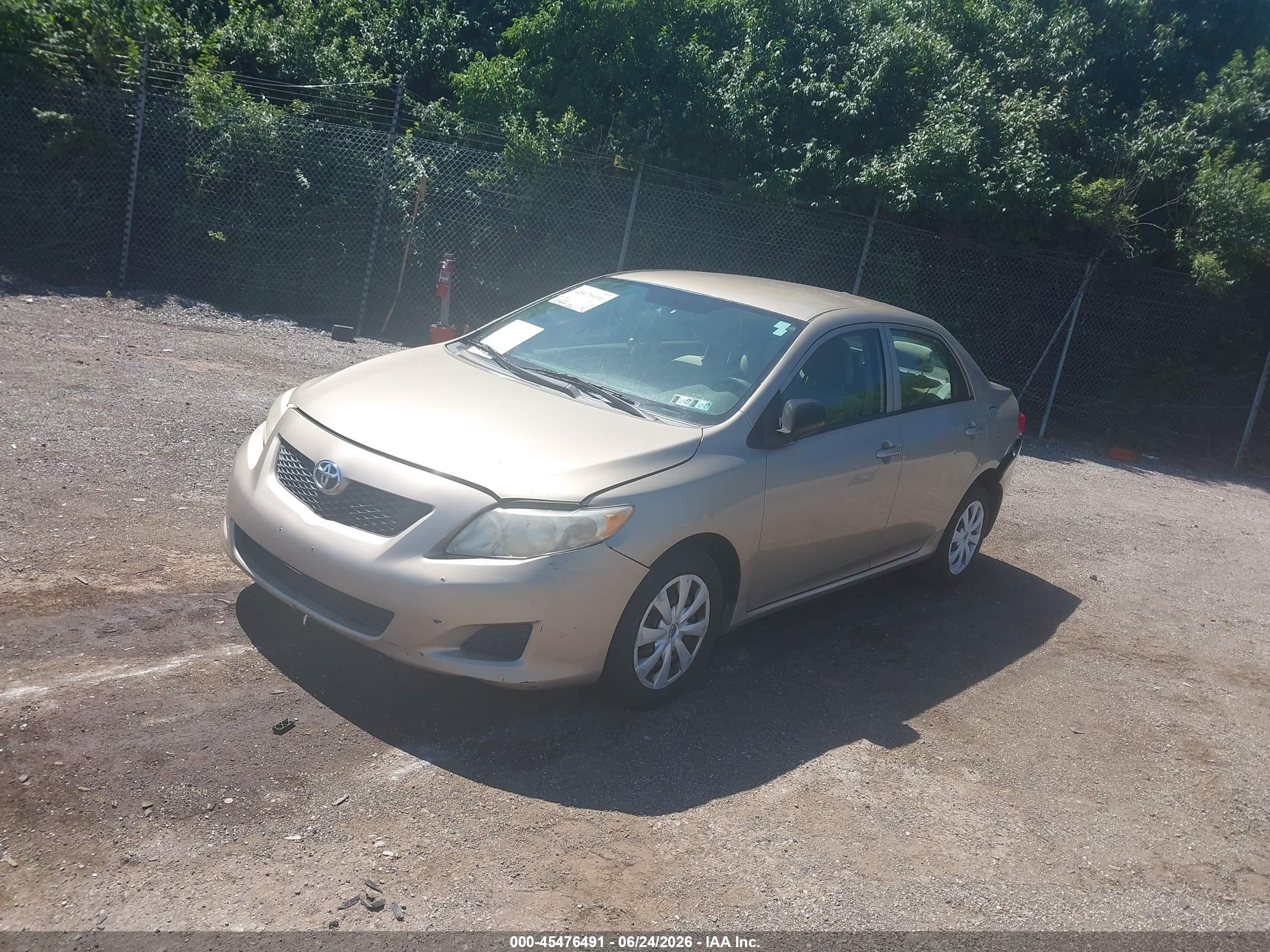 2009 Toyota Corolla   Gold vin: 2T1BU40E79C024637