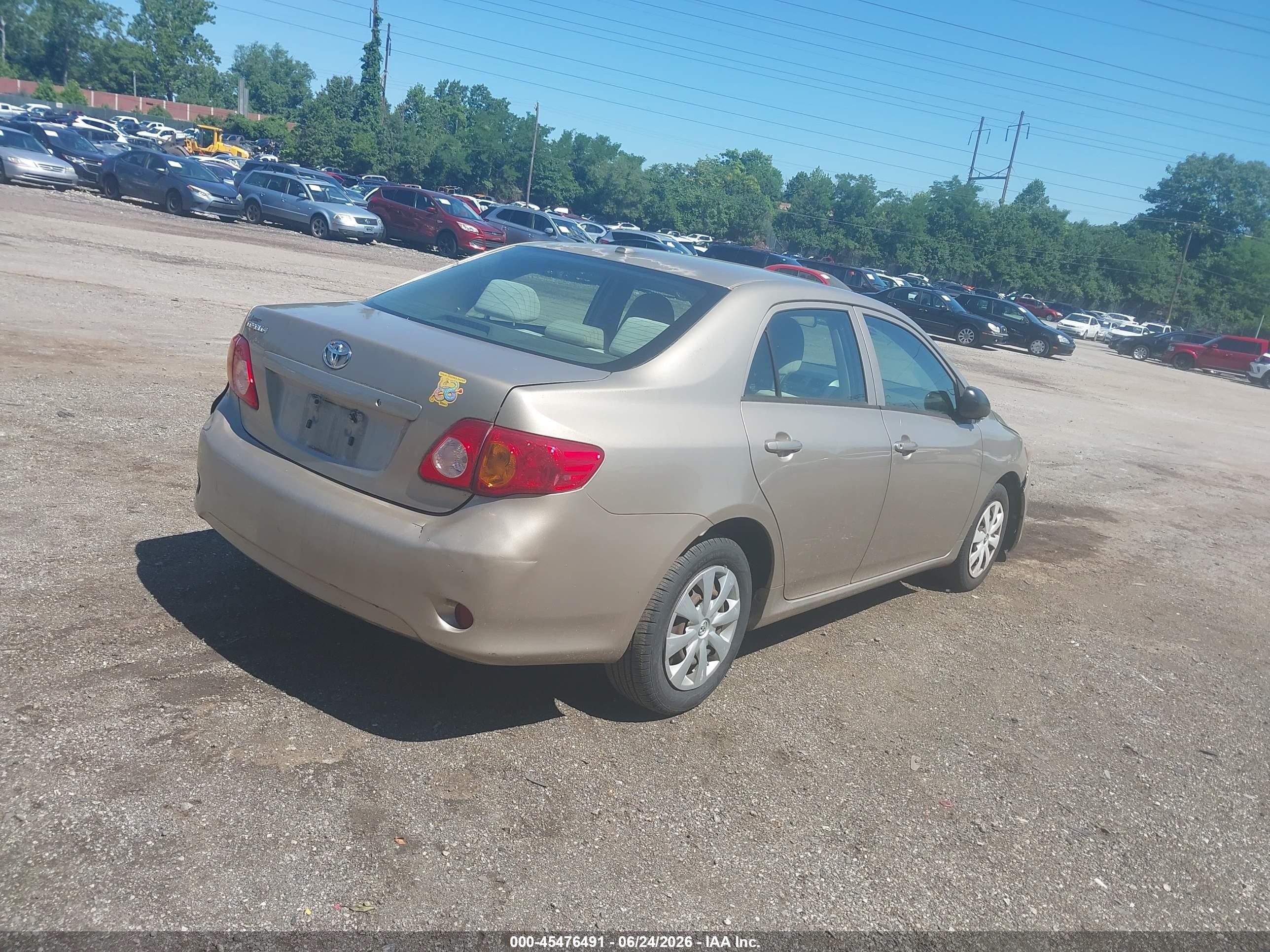 2009 Toyota Corolla   Gold vin: 2T1BU40E79C024637