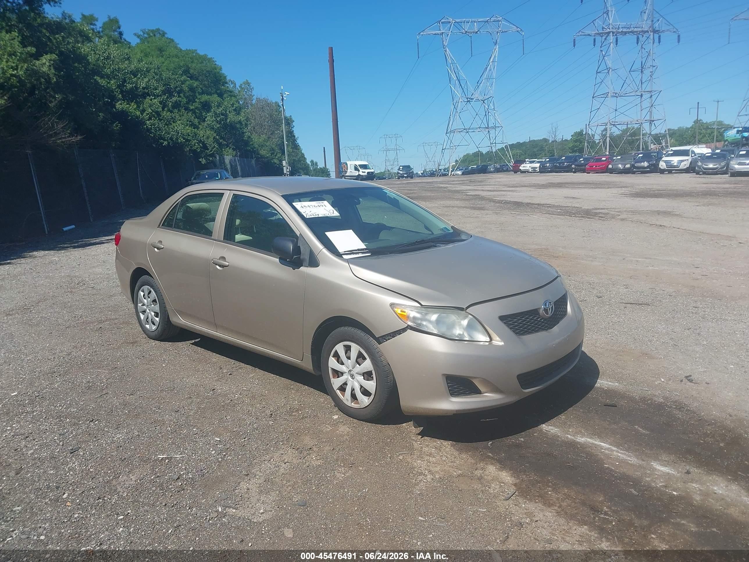 2009 Toyota Corolla   Gold vin: 2T1BU40E79C024637