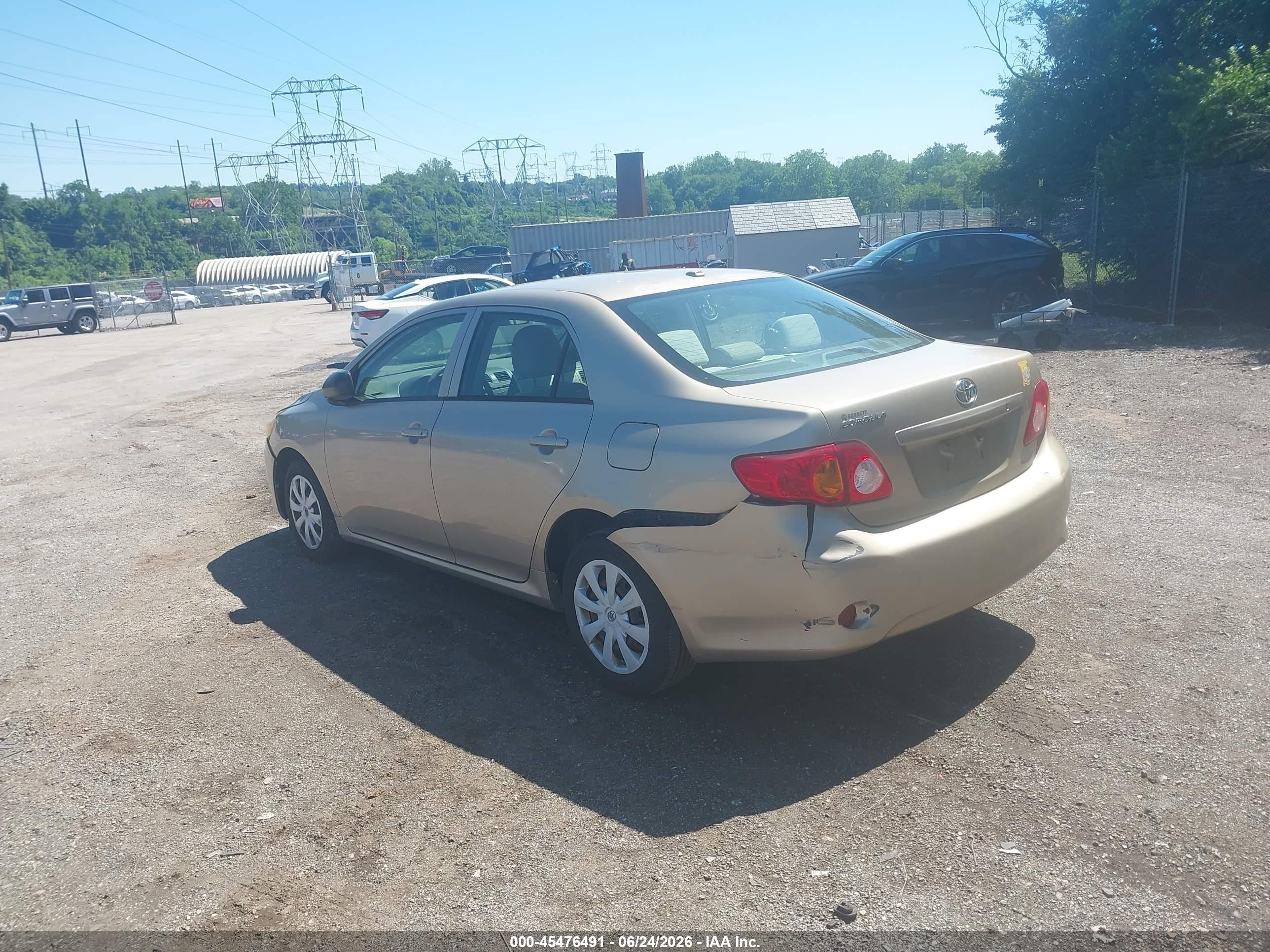 2009 Toyota Corolla   Gold vin: 2T1BU40E79C024637