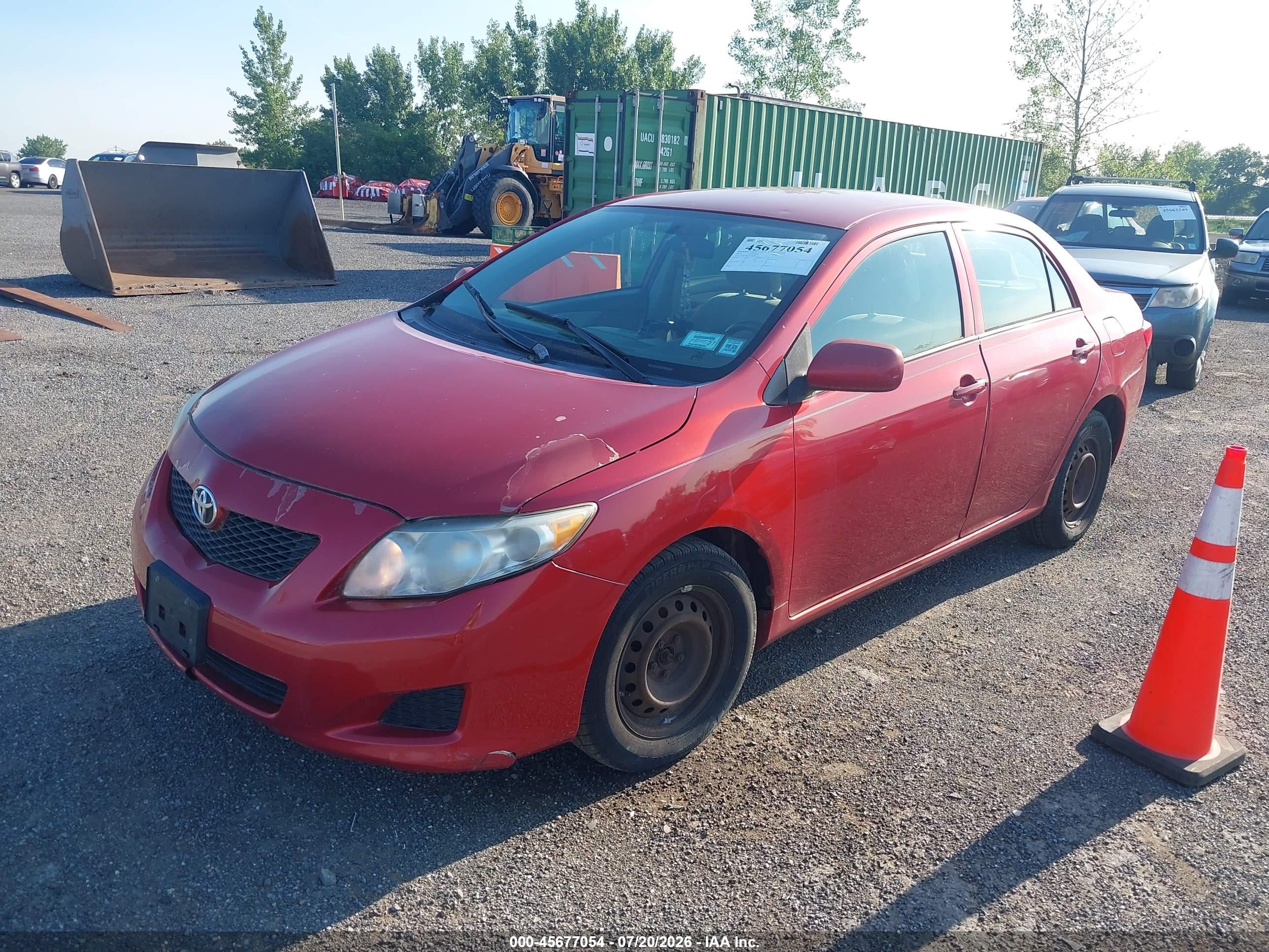 2009 Toyota Corolla Le Red vin: 2T1BU40E79C032396