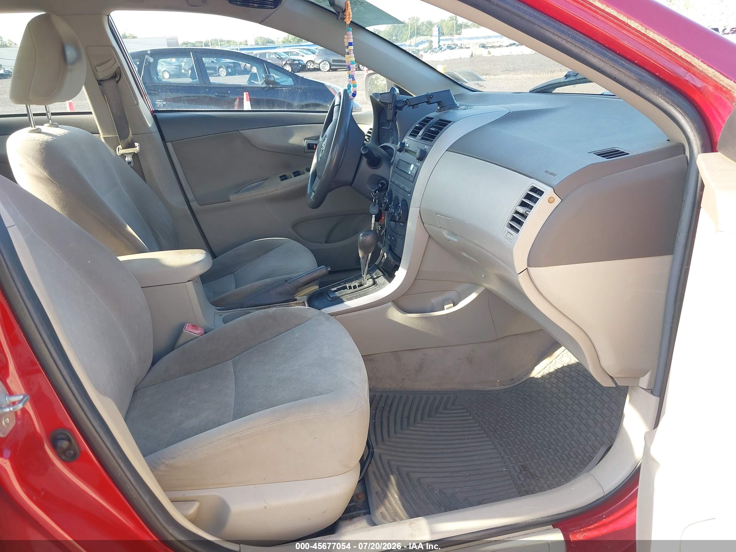 2009 Toyota Corolla Le Red vin: 2T1BU40E79C032396
