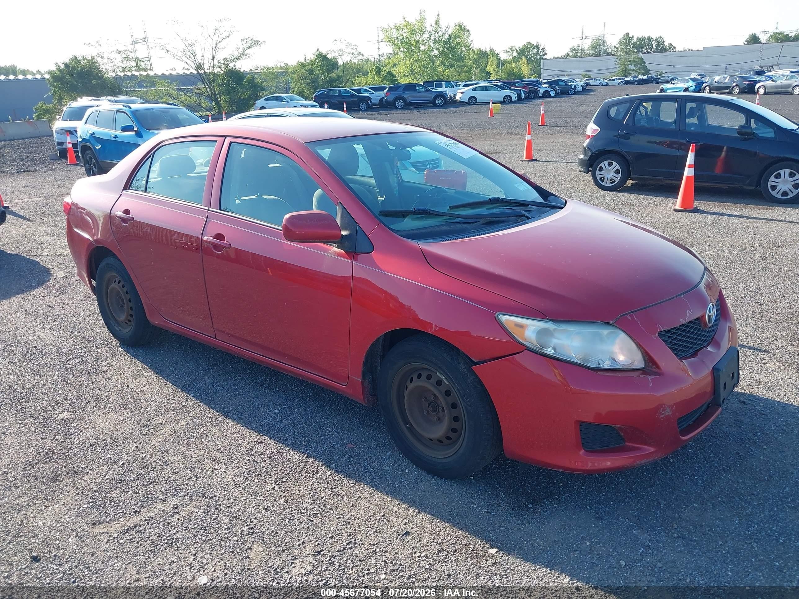 2009 Toyota Corolla Le Red vin: 2T1BU40E79C032396