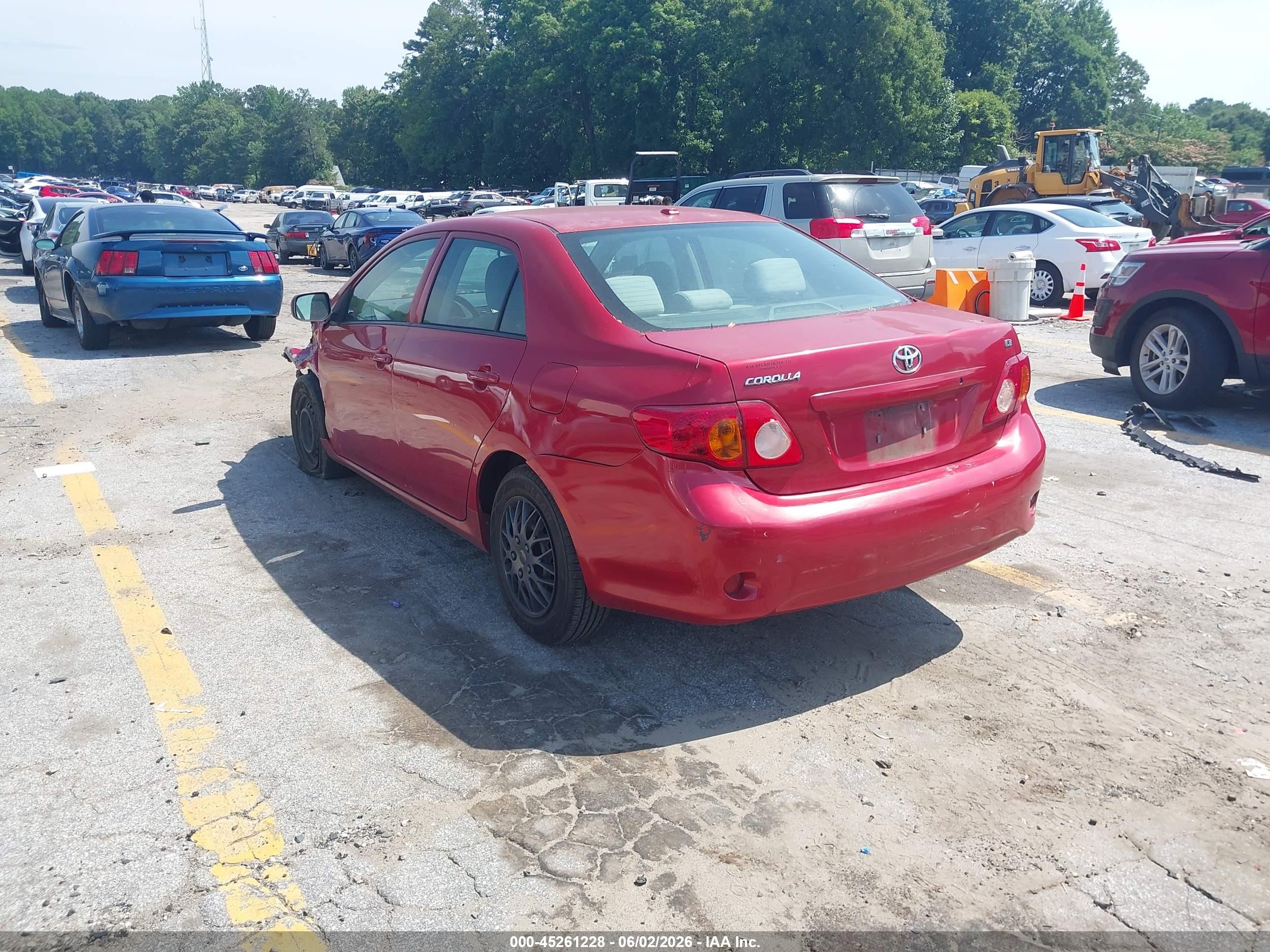 2009 Toyota Corolla Le Red vin: 2T1BU40E79C133129