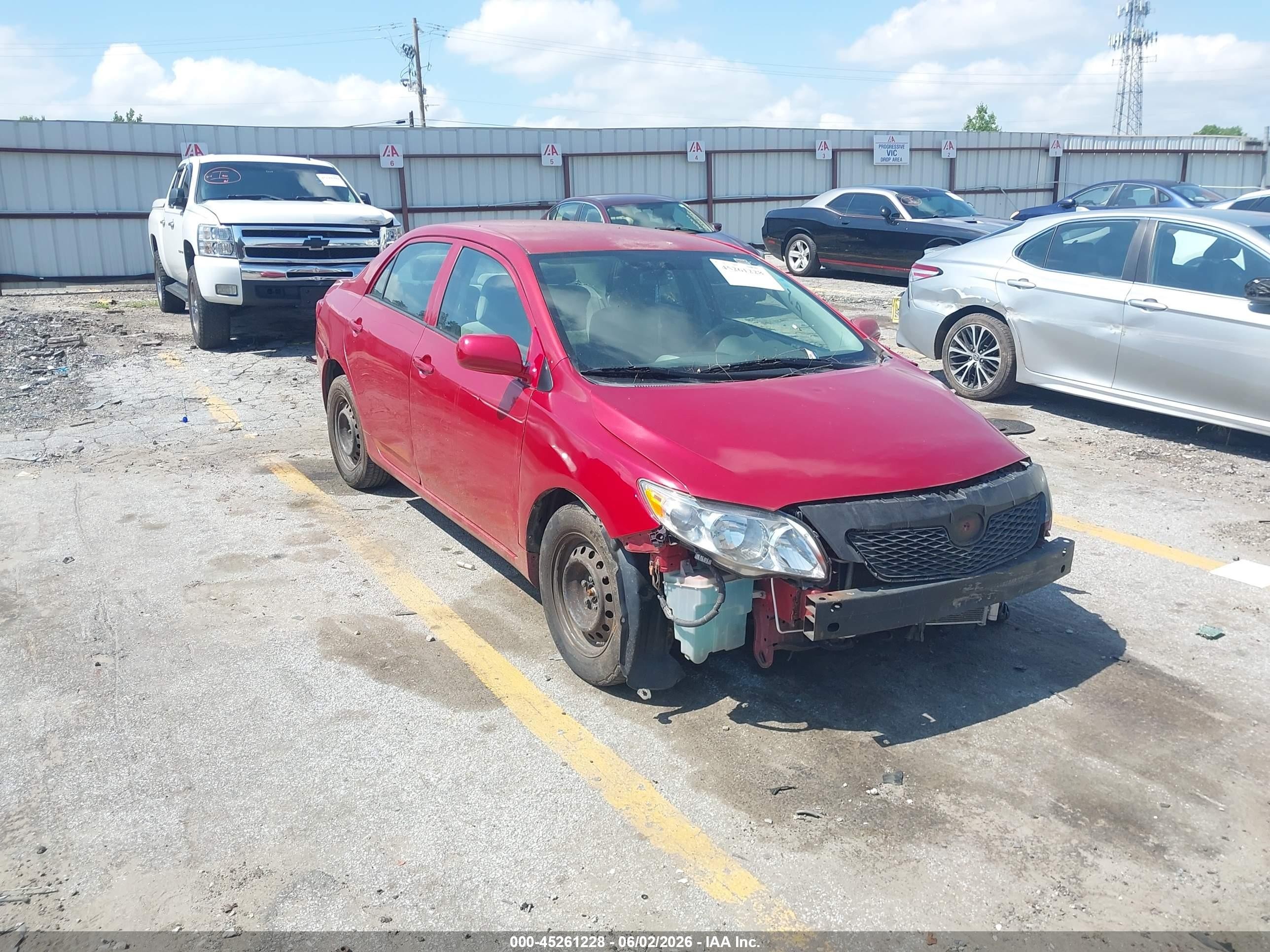 2009 Toyota Corolla Le Red vin: 2T1BU40E79C133129