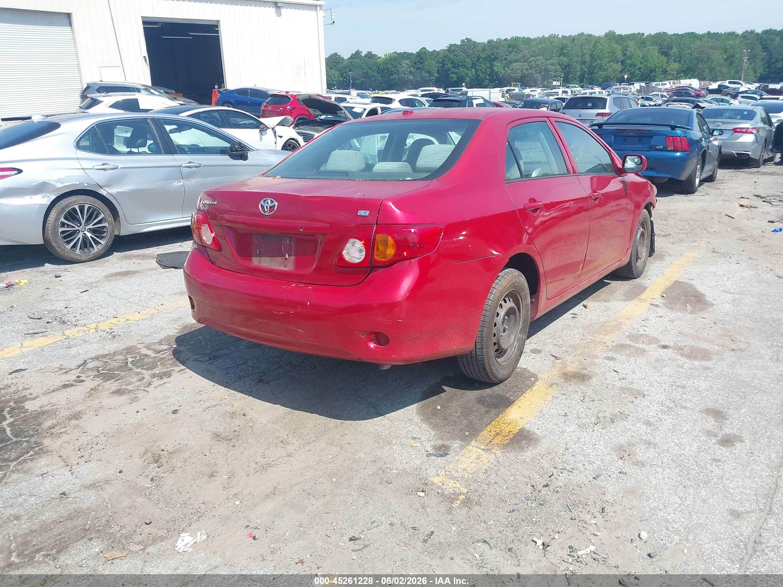2009 Toyota Corolla Le Red vin: 2T1BU40E79C133129