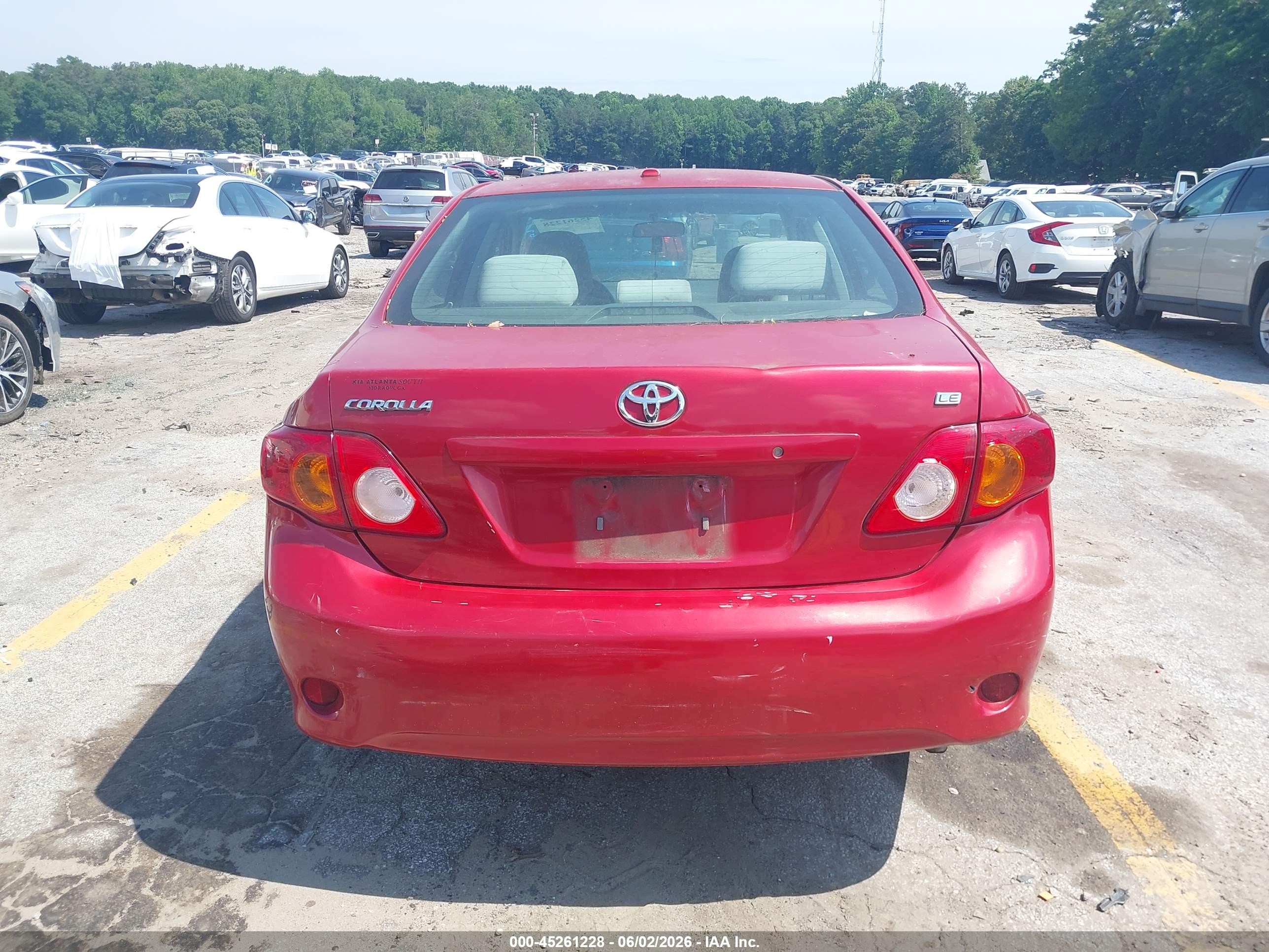 2009 Toyota Corolla Le Red vin: 2T1BU40E79C133129