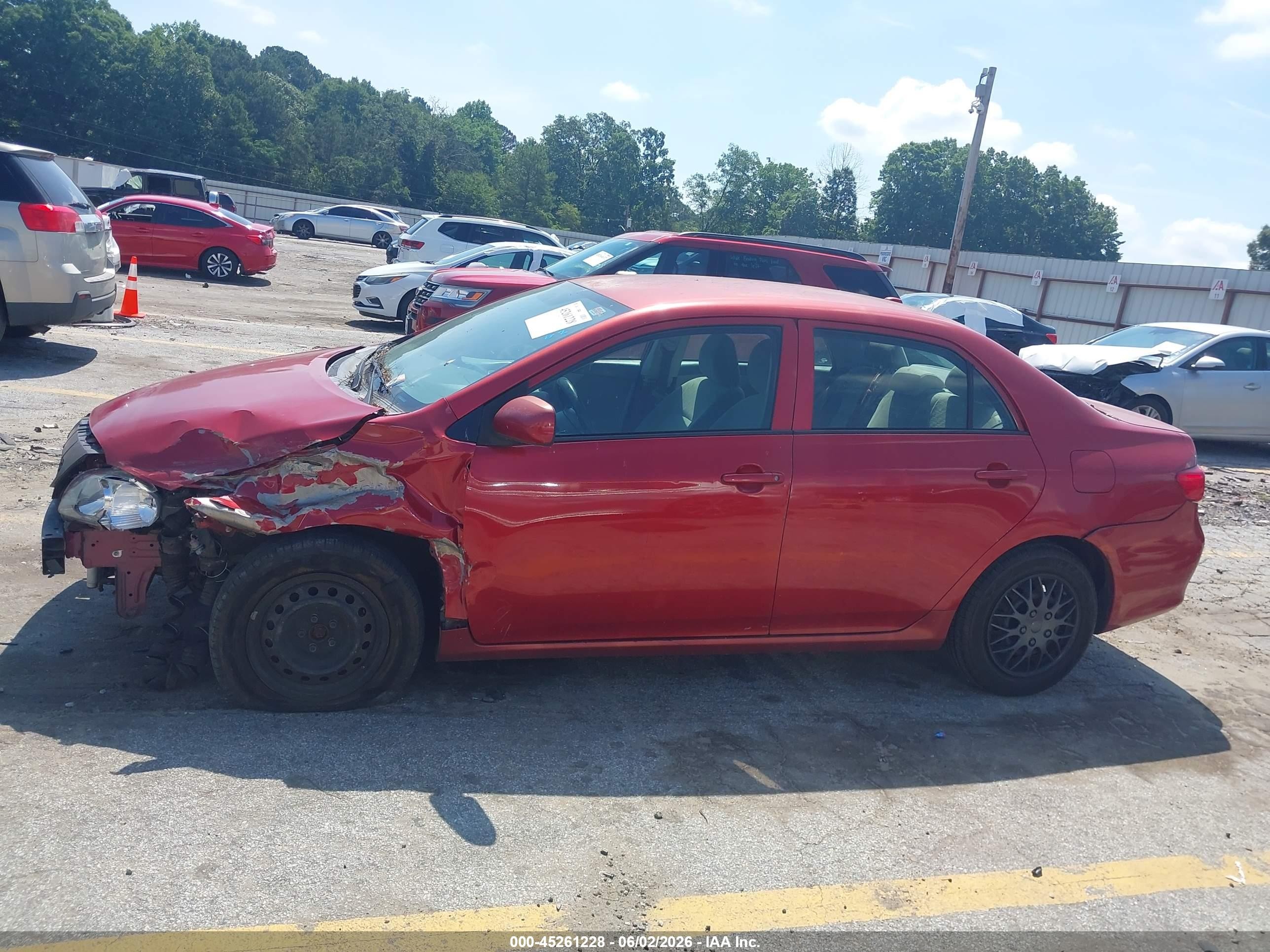 2009 Toyota Corolla Le Red vin: 2T1BU40E79C133129