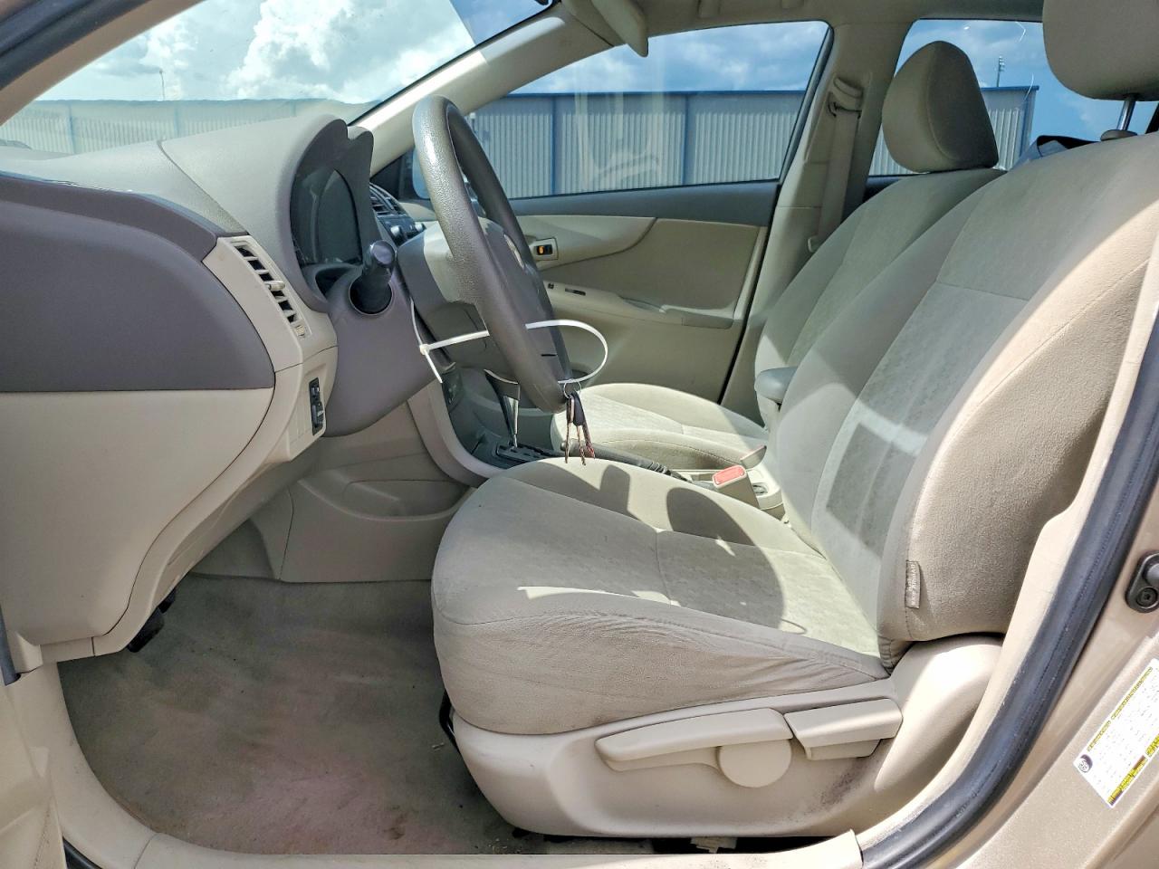 2009 Toyota Corolla Le Beige vin: 2T1BU40E99C157366