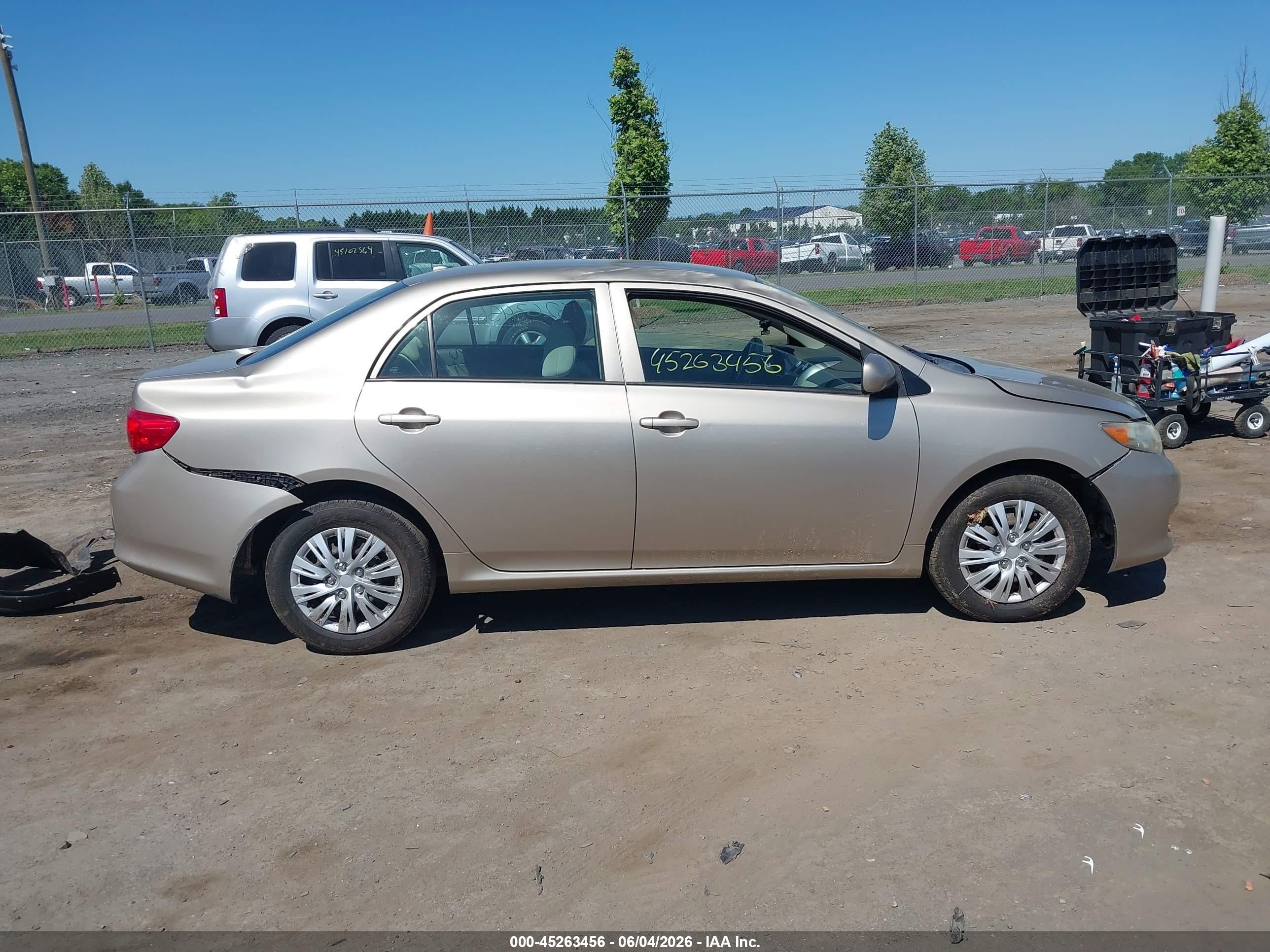2009 Toyota Corolla Le Gold vin: 2T1BU40E99C166102