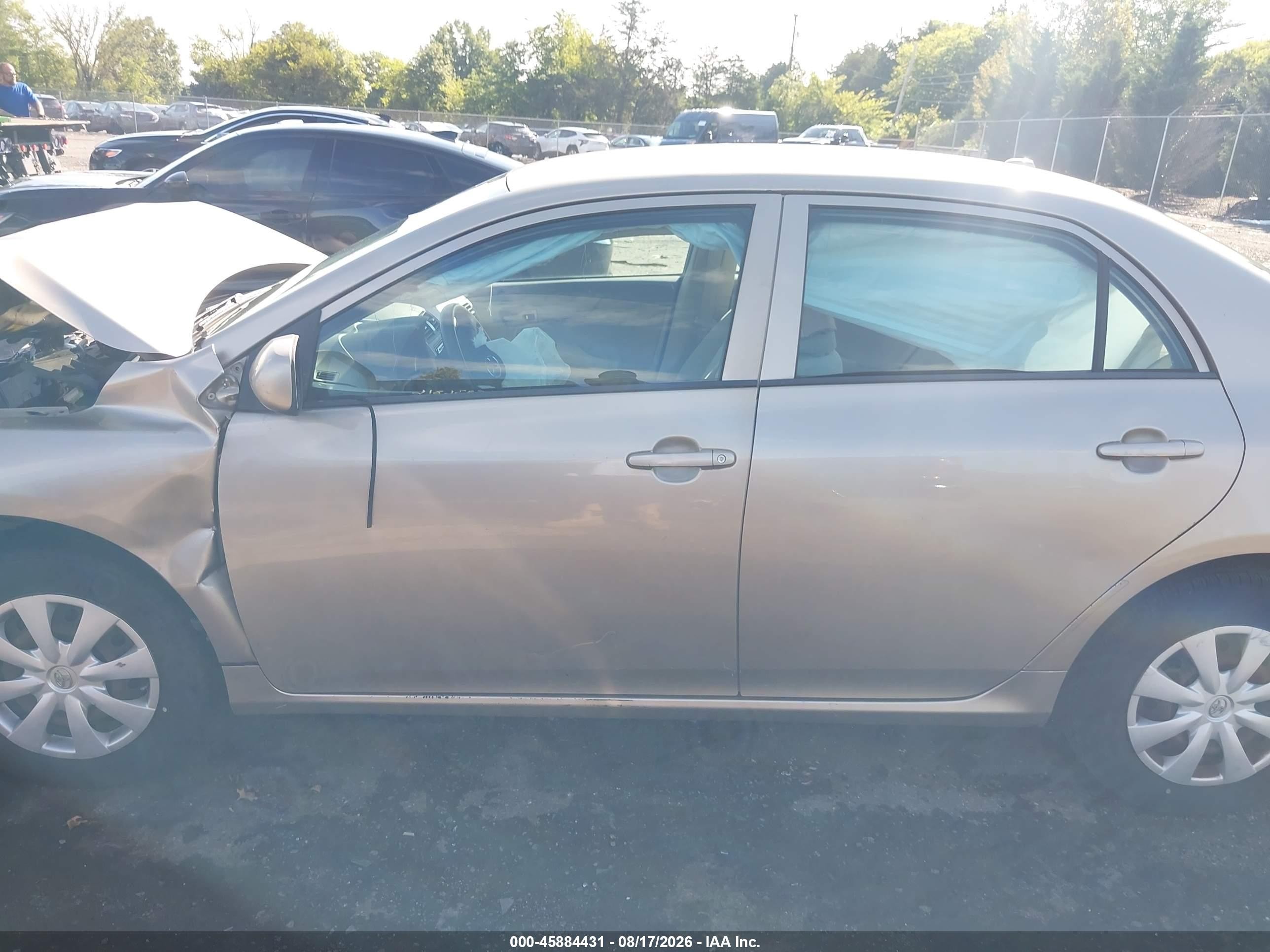 2009 Toyota Corolla Le Gold vin: 2T1BU40E99C180582